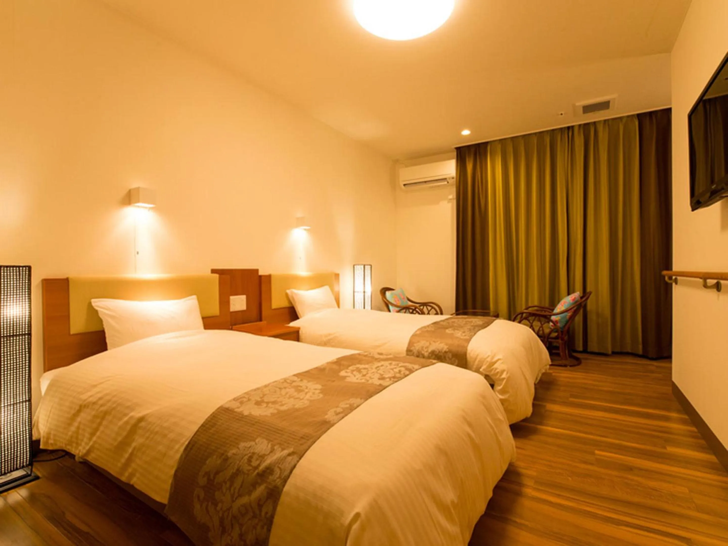 Photo of the whole room, Bed in Sun Green Resort Hotel Ishigaki