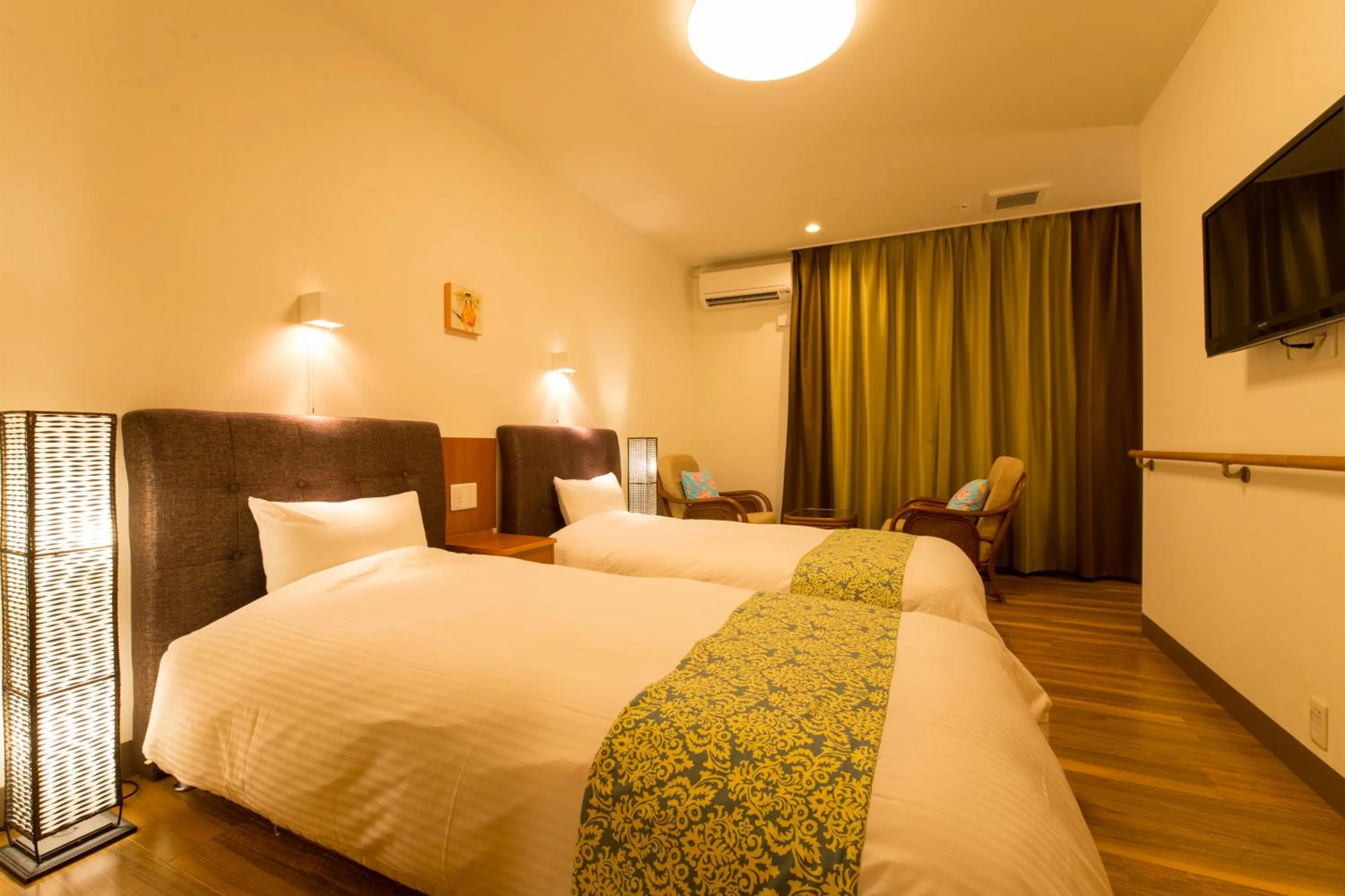 Photo of the whole room, Bed in Sun Green Resort Hotel Ishigaki