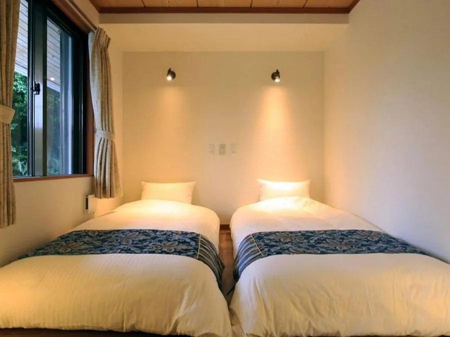 Bed in Sun Green Resort Hotel Ishigaki