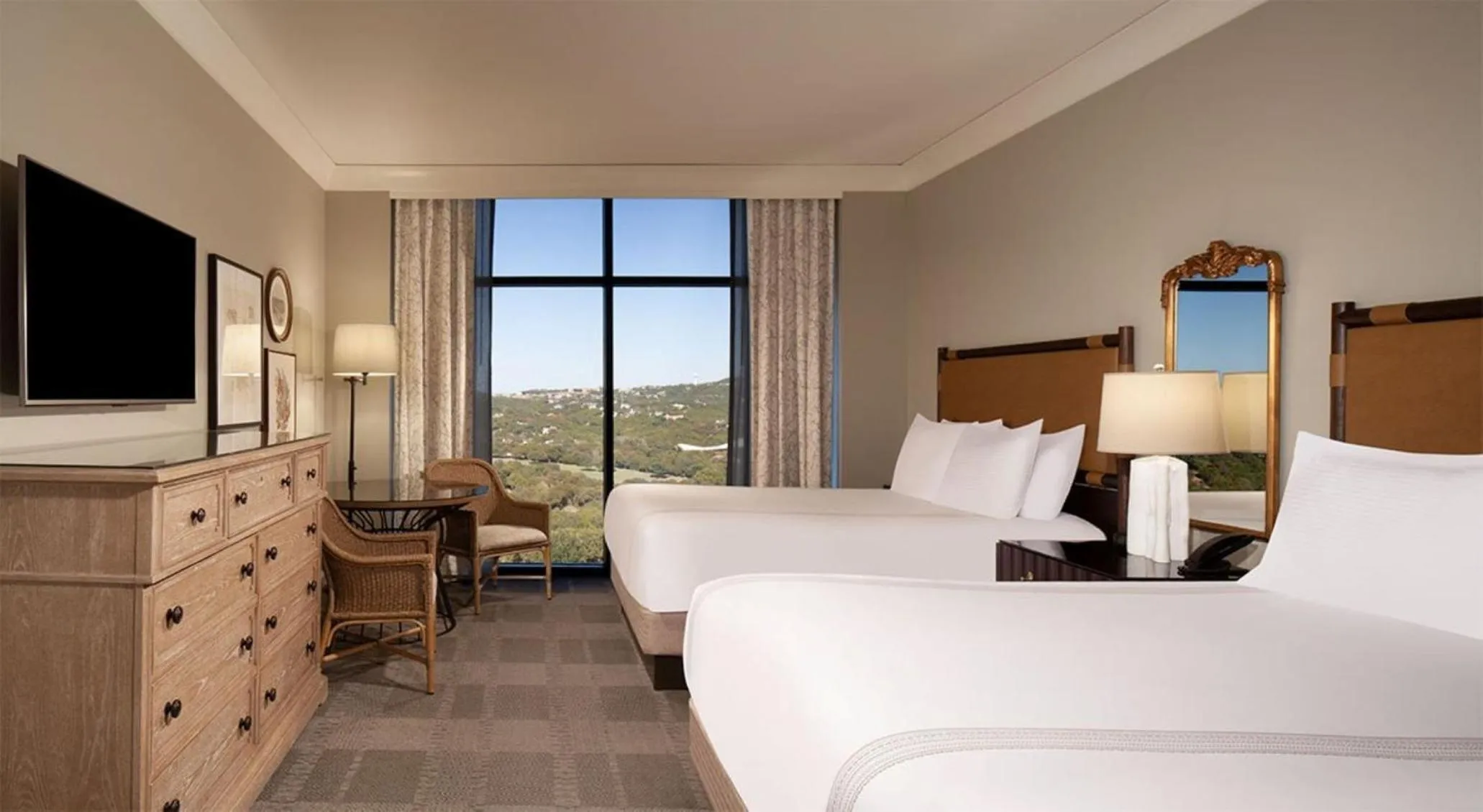 Photo of the whole room, Bed in Omni Barton Creek Resort and Spa Austin