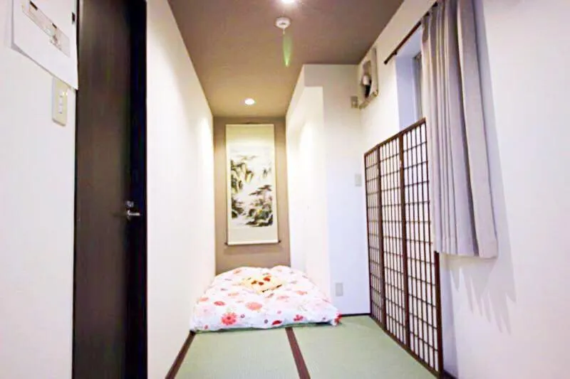 Bed in Osaka Nakayama Guesthouse