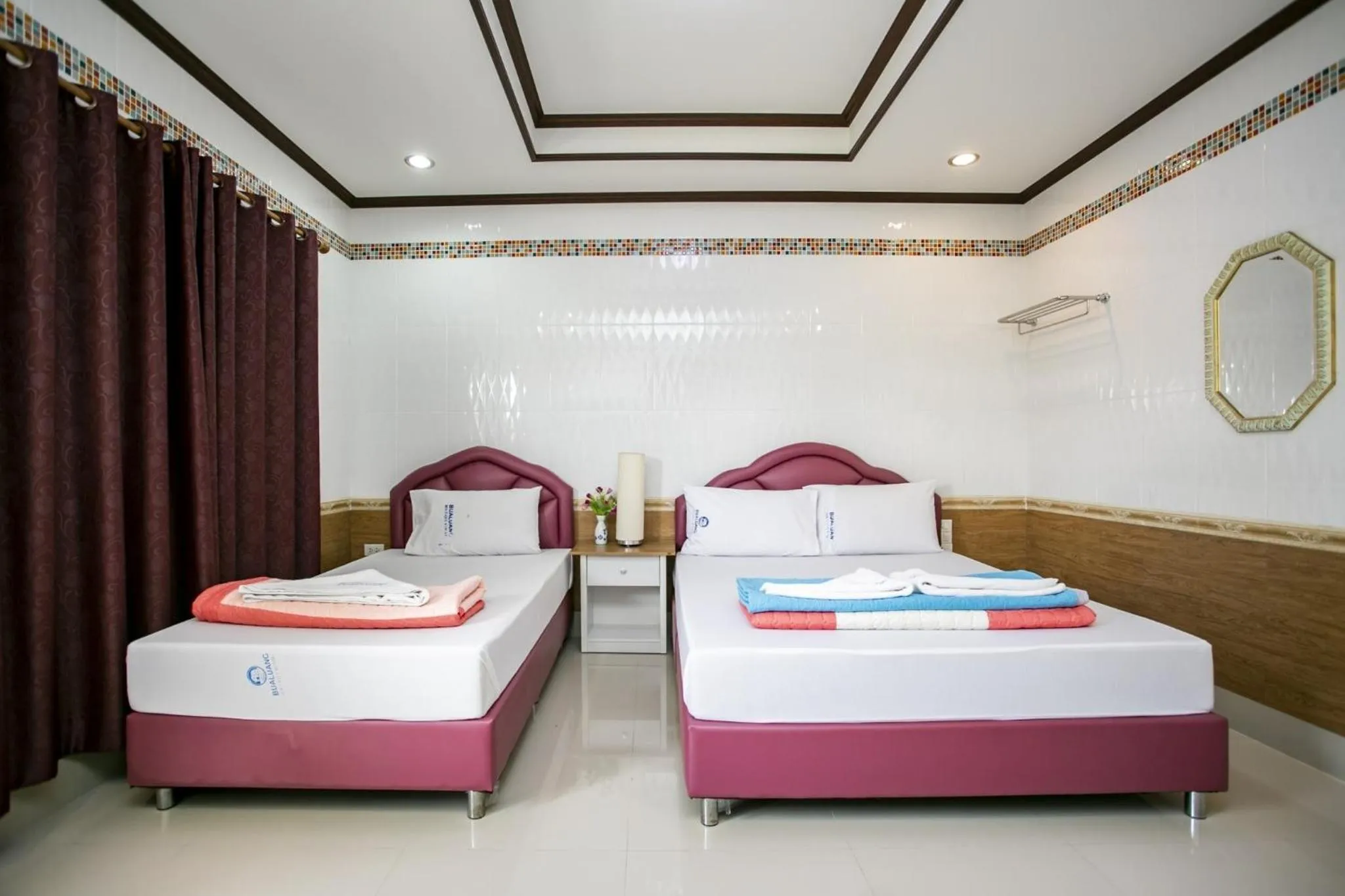 Bed in Bualuang Boutique Resort