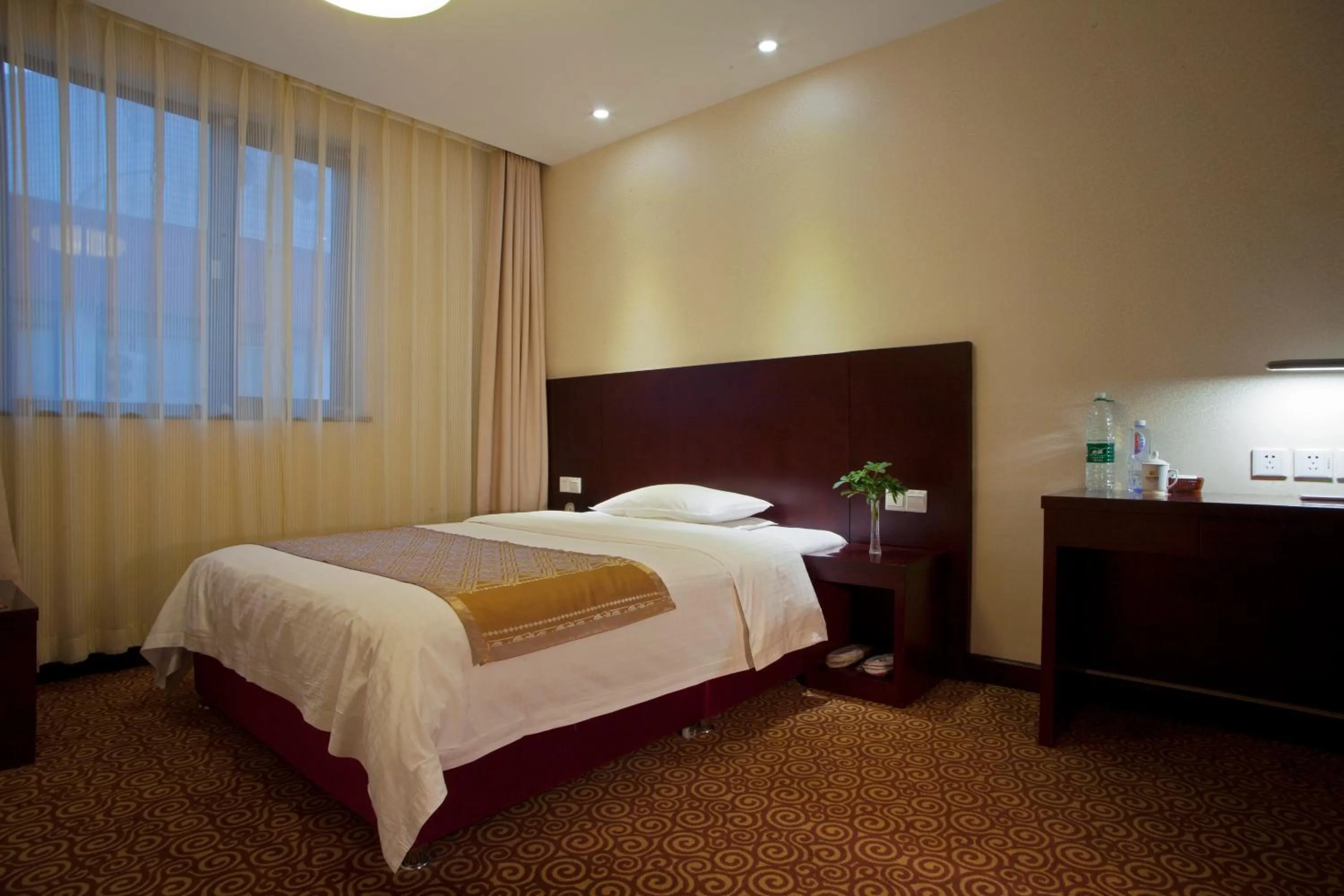 Bed in Xijiao Hotel Beijing