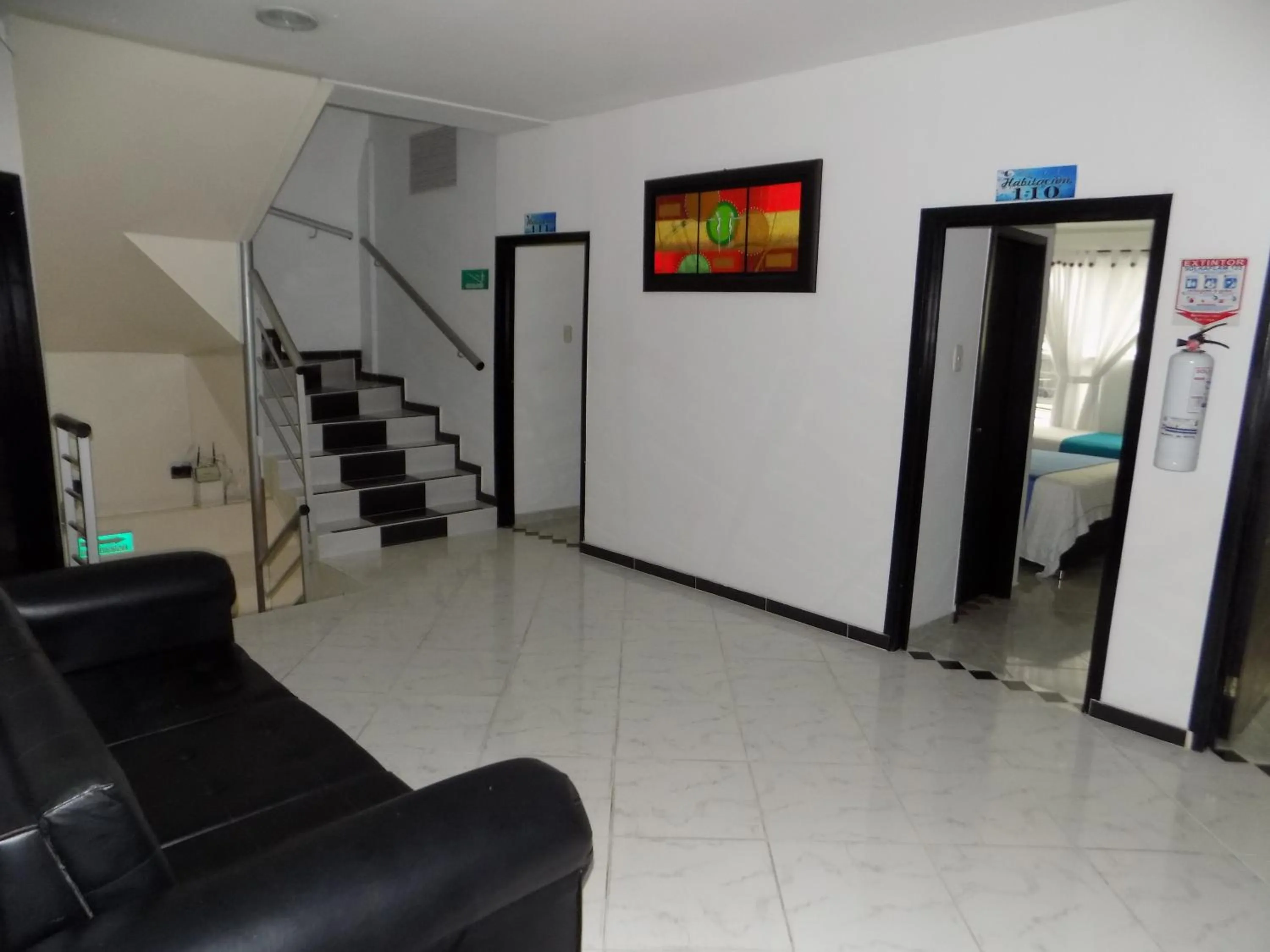 Communal lounge/ TV room in Hotel Luna Azul