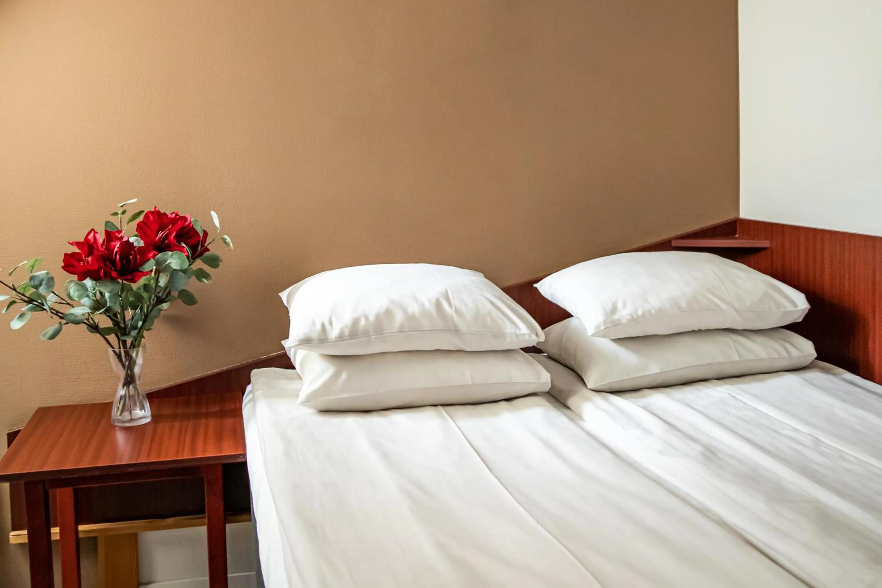 Bed in Hotel Kupolen