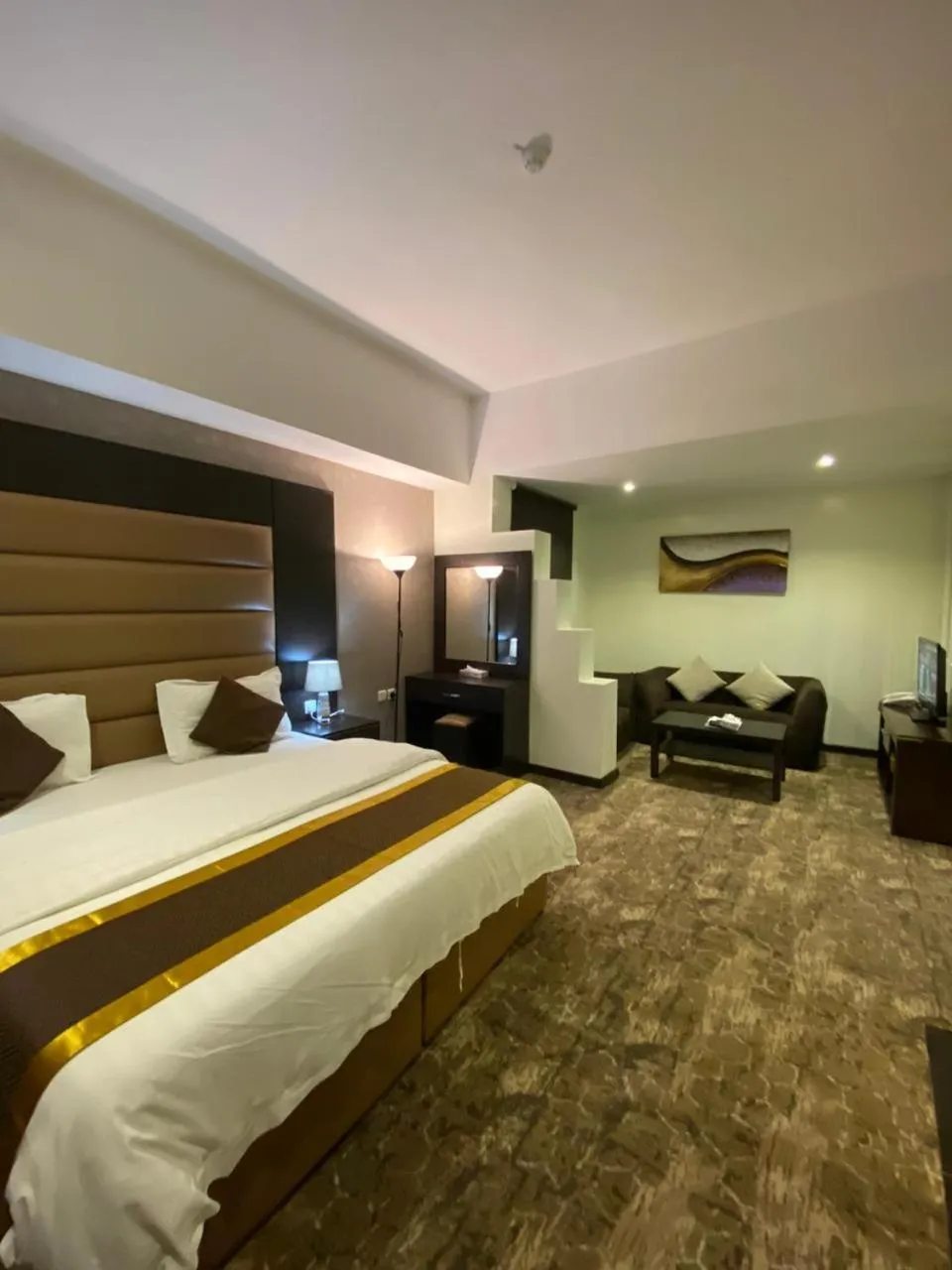 Photo of the whole room, Bed in Desert Rose