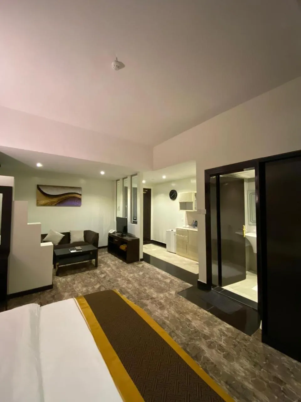 Photo of the whole room, Bed in Desert Rose