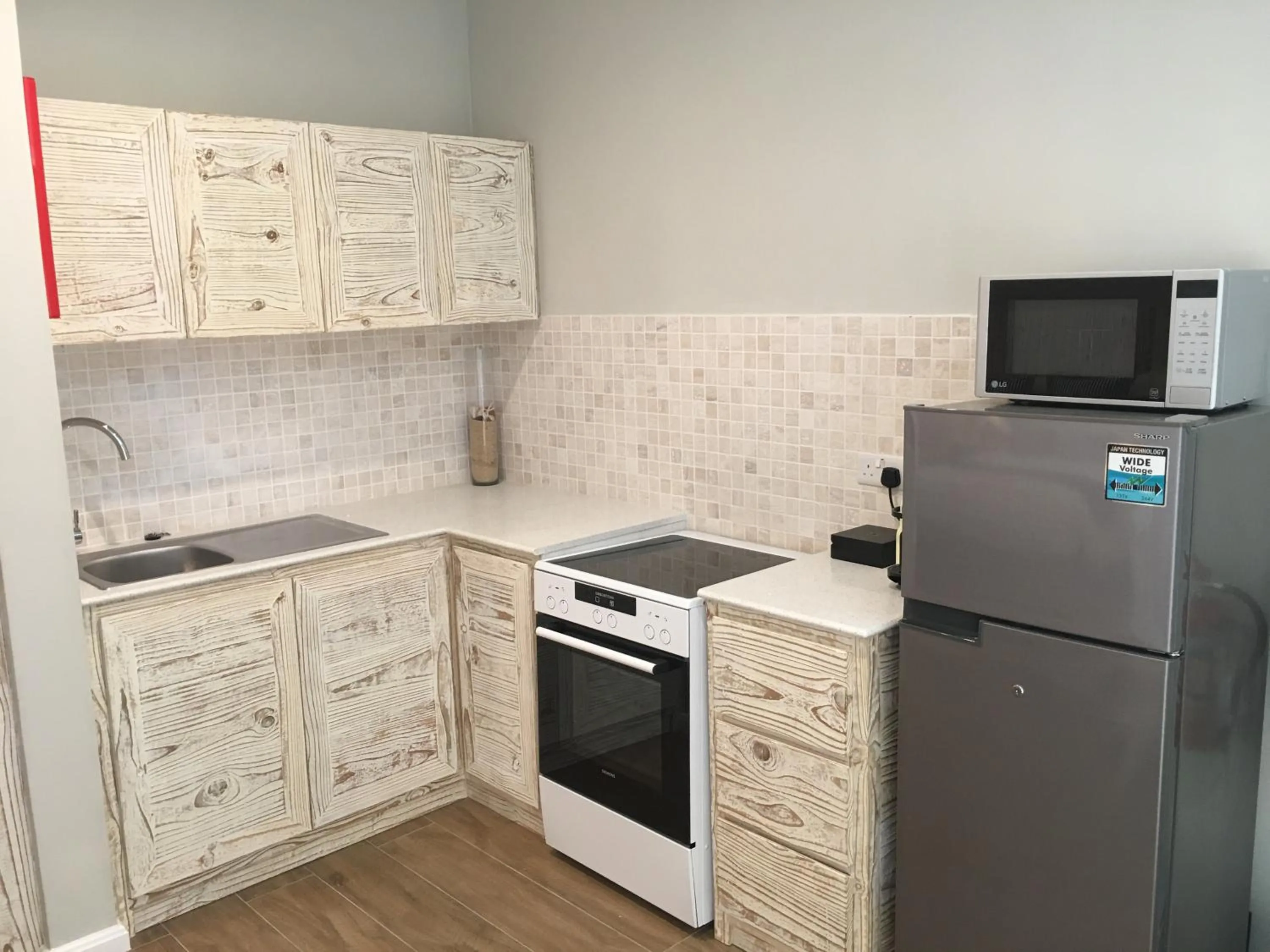 Kitchen or kitchenette in Le Nautique Beachfront Apartments