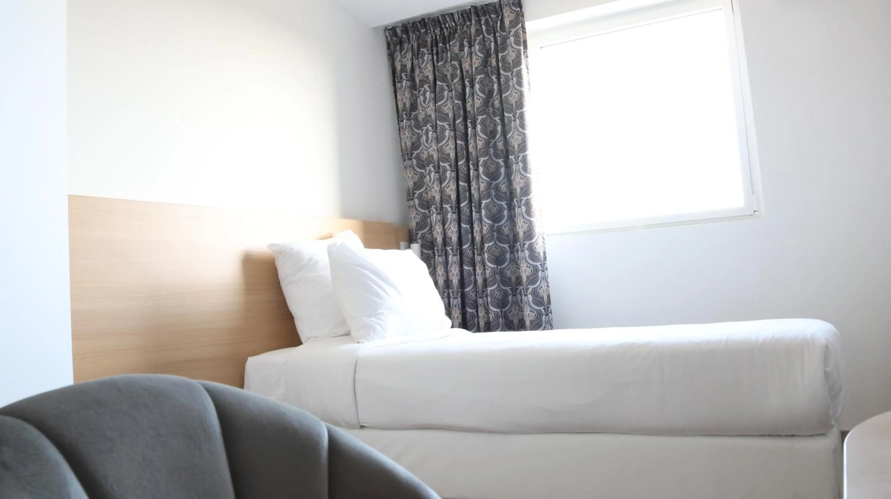 Bed in Geographotel Paris-Roissy CDG Airport