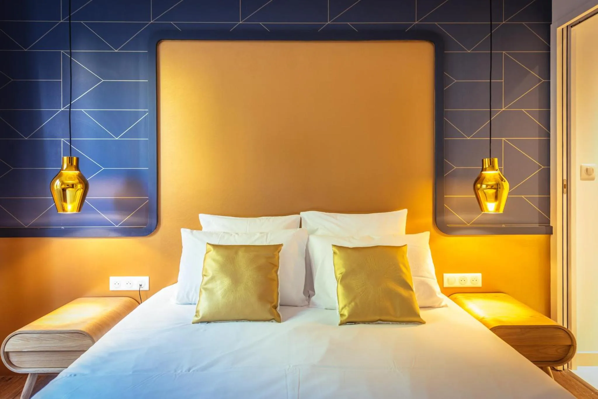 Decorative detail, Bed in The Originals Boutique, Hôtel Le Londres, Saumur