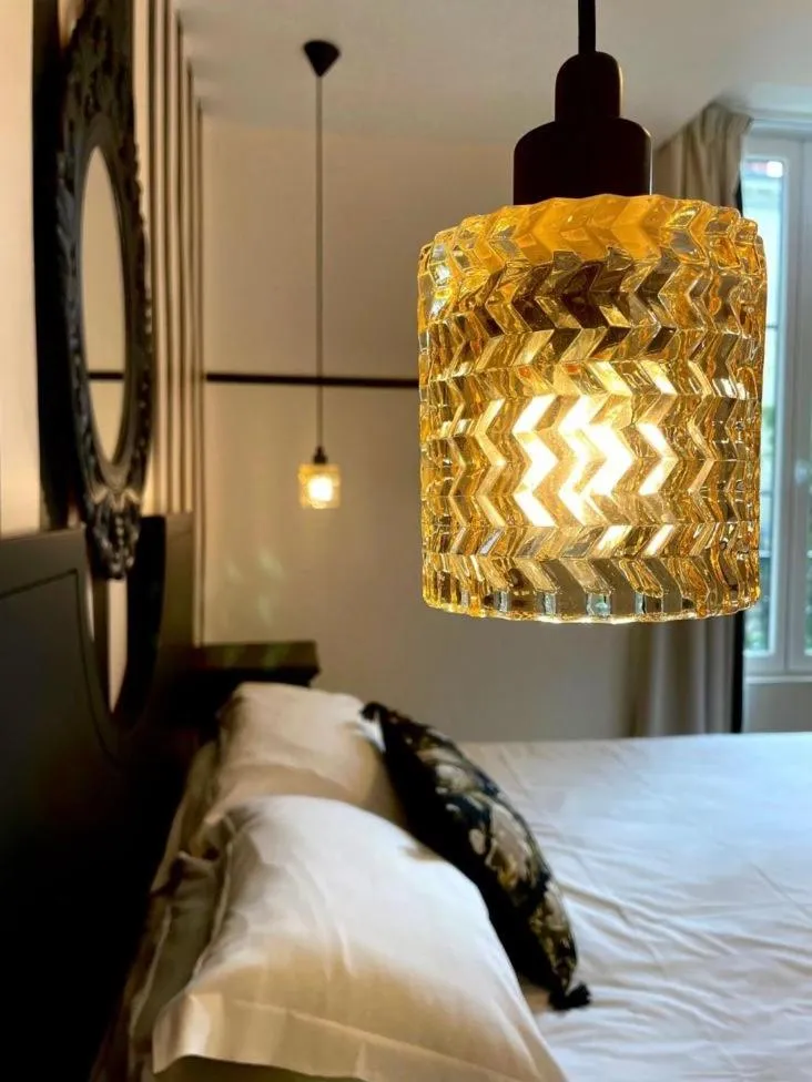 Decorative detail, Bed in The Originals Boutique, Hôtel Le Londres, Saumur