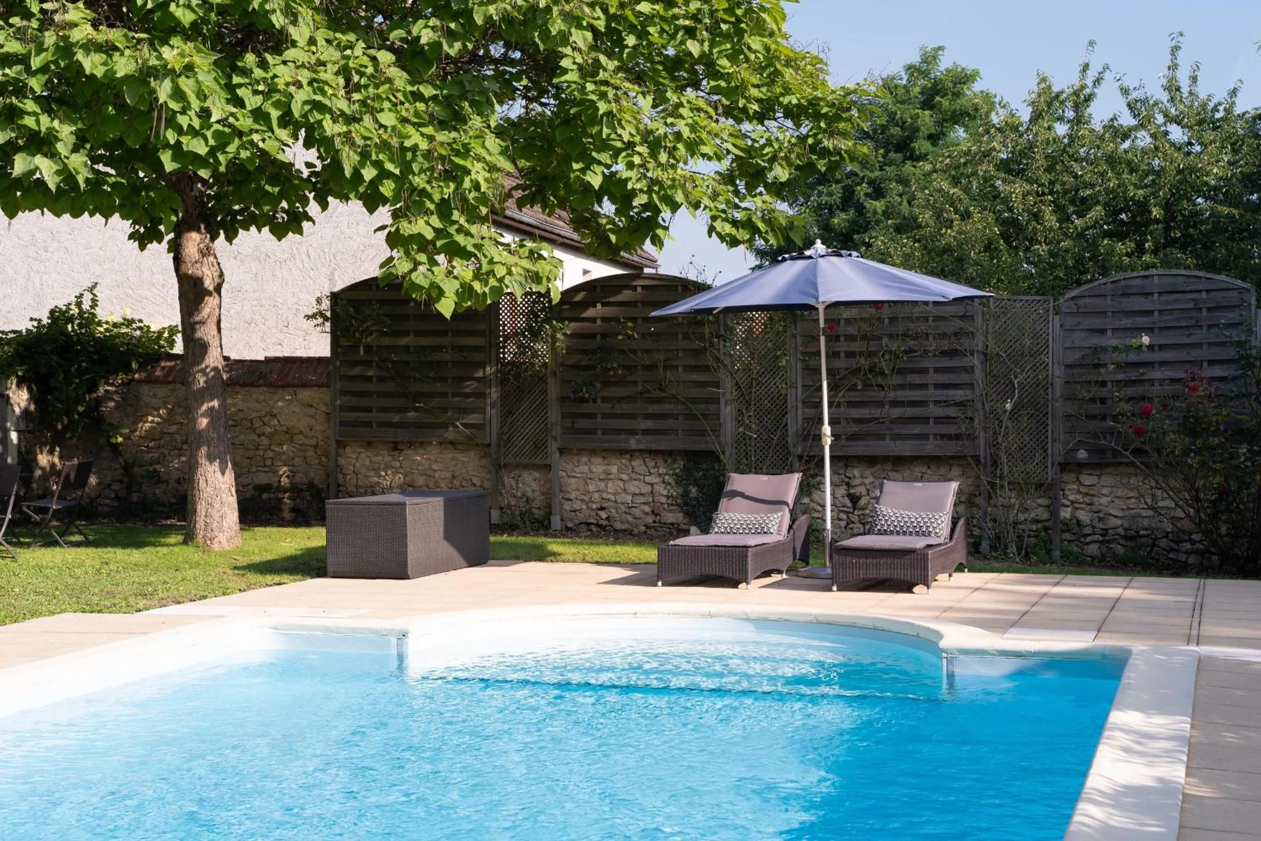 Pool view in Le Clos de La Rousselière B and B
