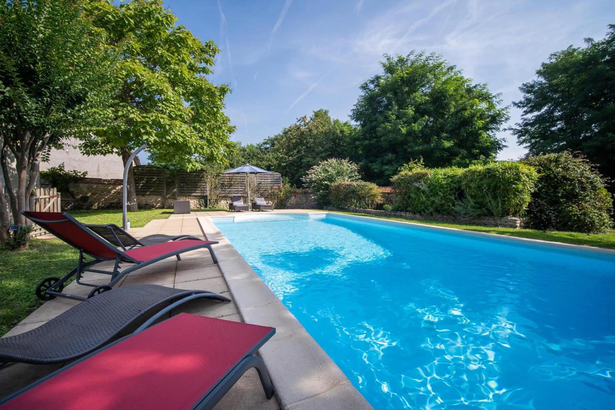 Pool view in Le Clos de La Rousselière B and B