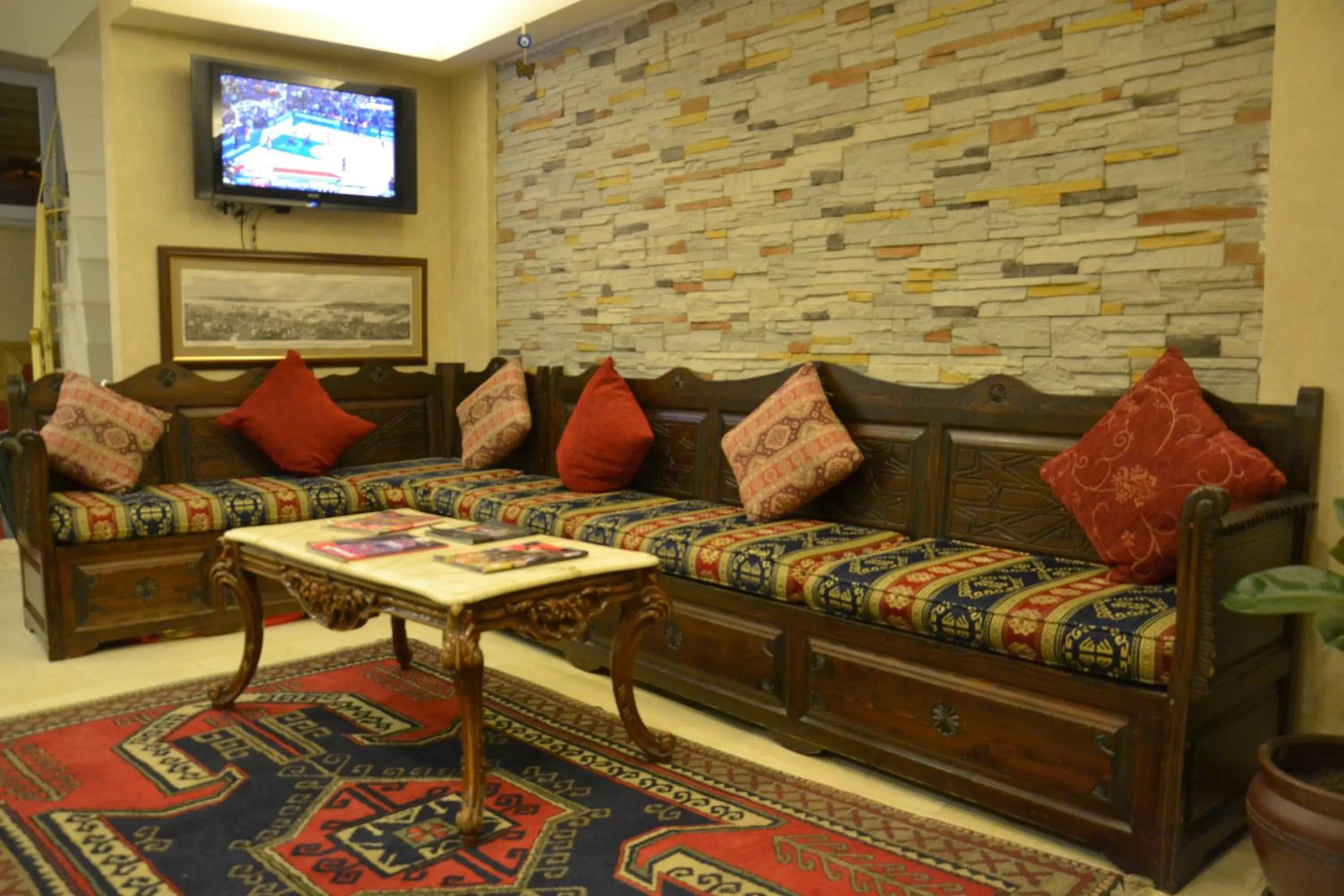 Communal lounge/ TV room in Kaftan Hotel