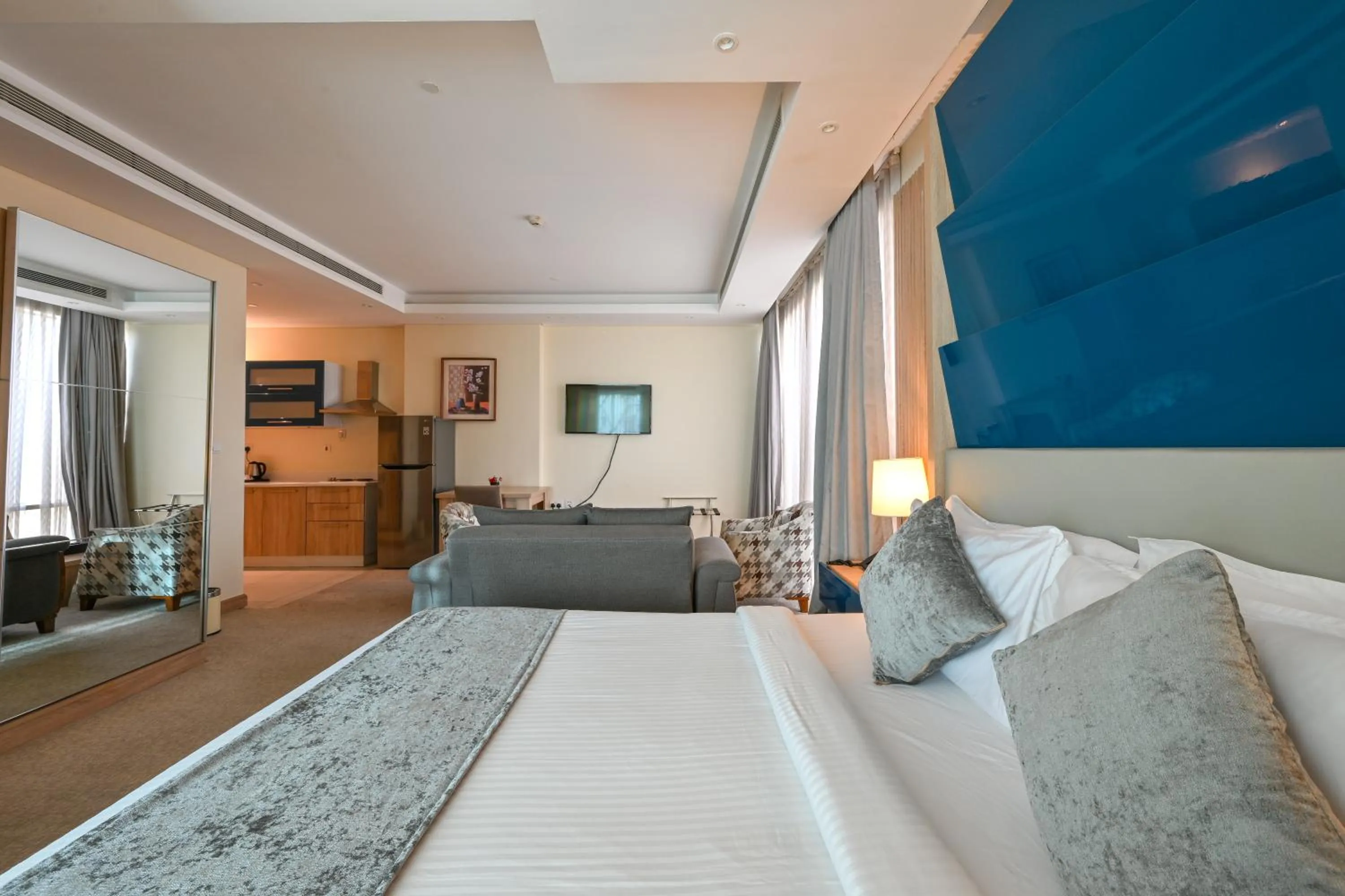 Bed in Al Mansour Suites Hotel