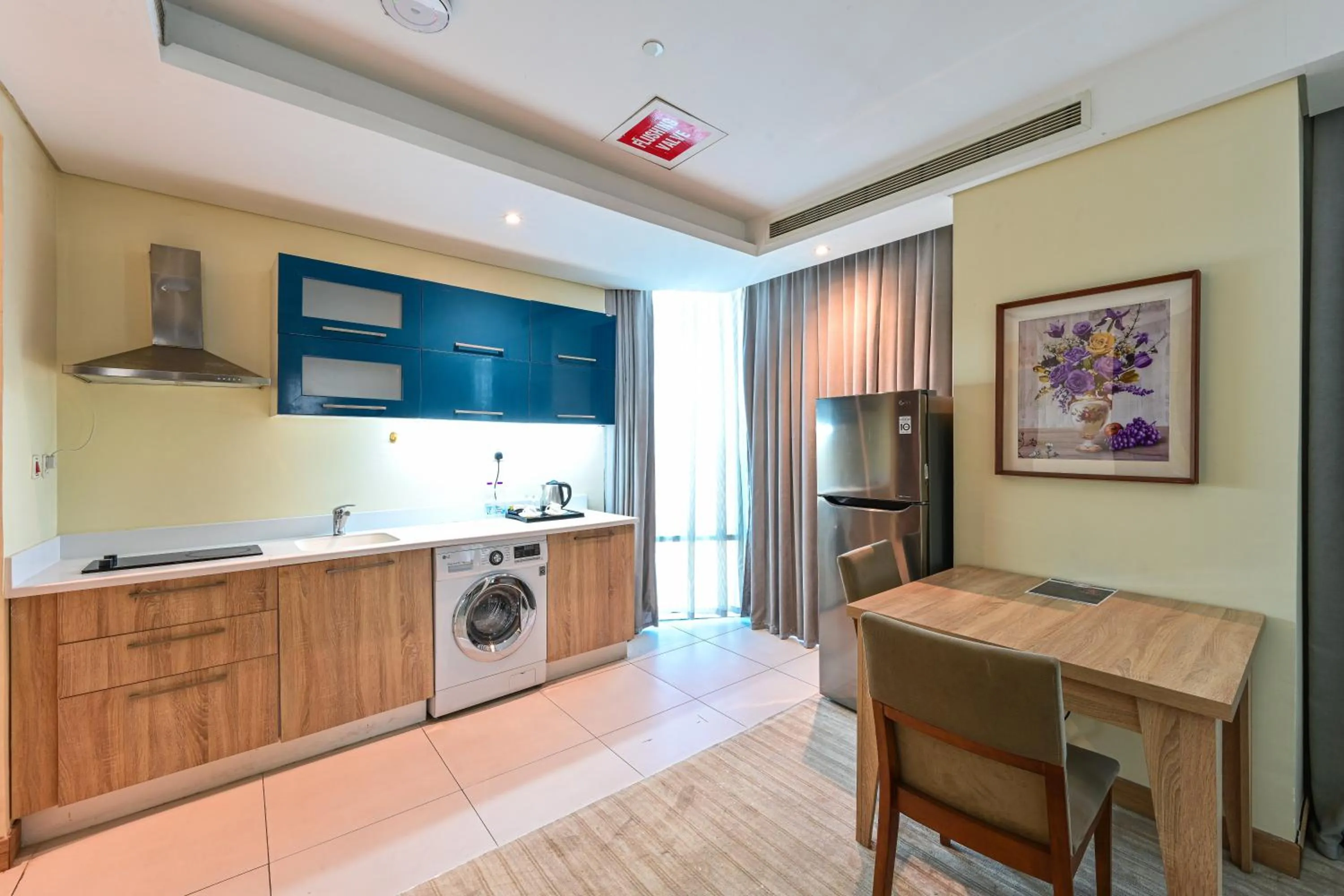 Kitchen or kitchenette in Al Mansour Suites Hotel