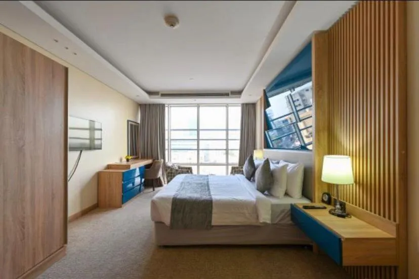 Photo of the whole room, Bed in Al Mansour Suites Hotel