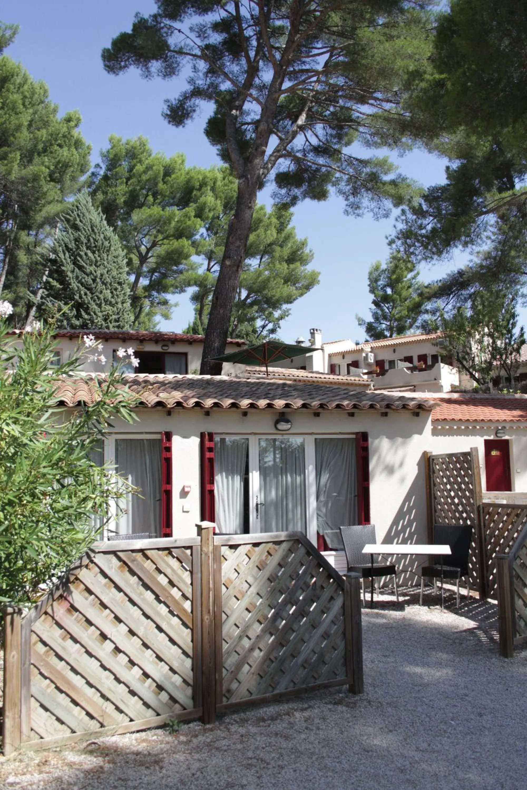 Patio in Hôtel Le Mas des Ecureuils