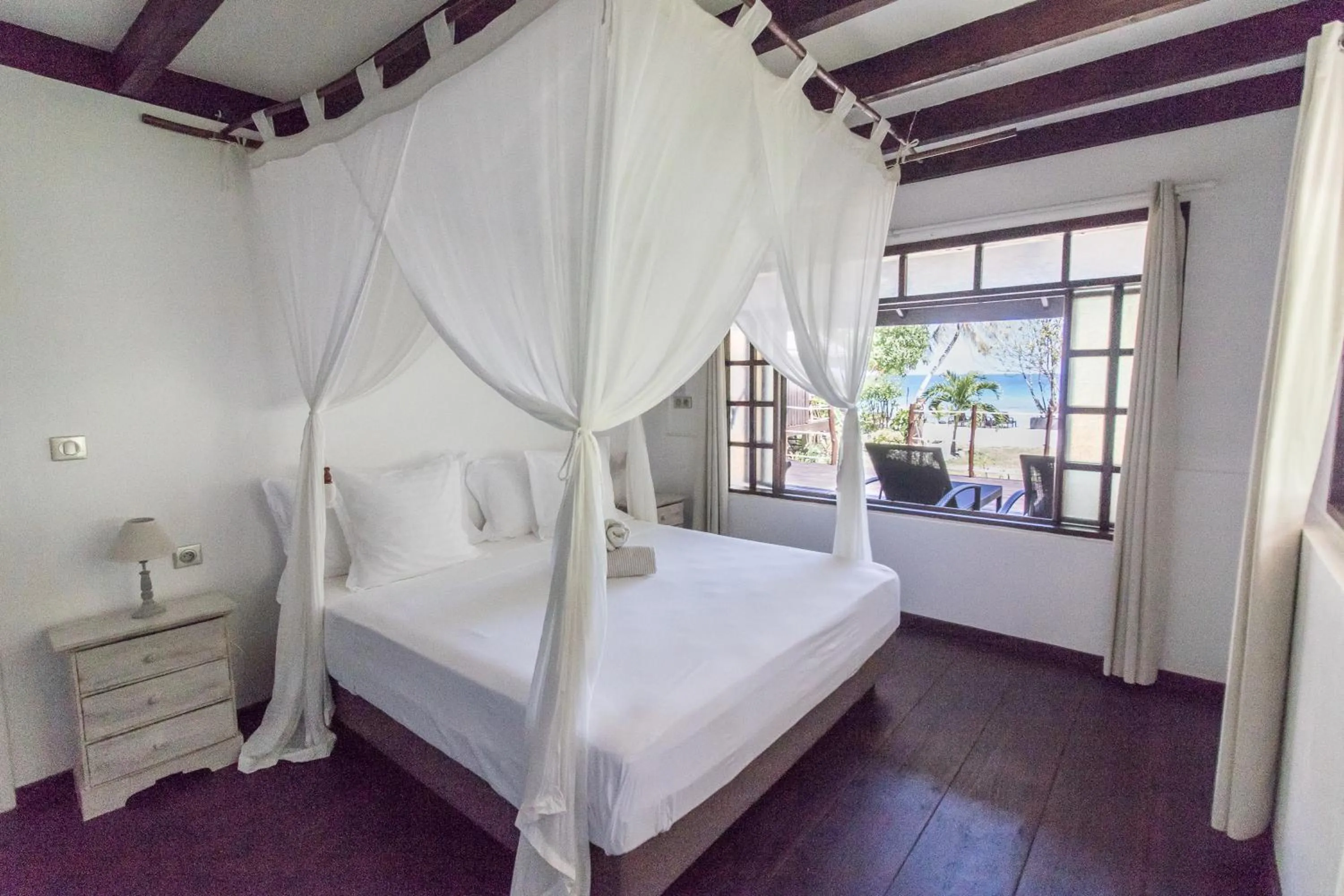 Bed in Le Coconut Lodge