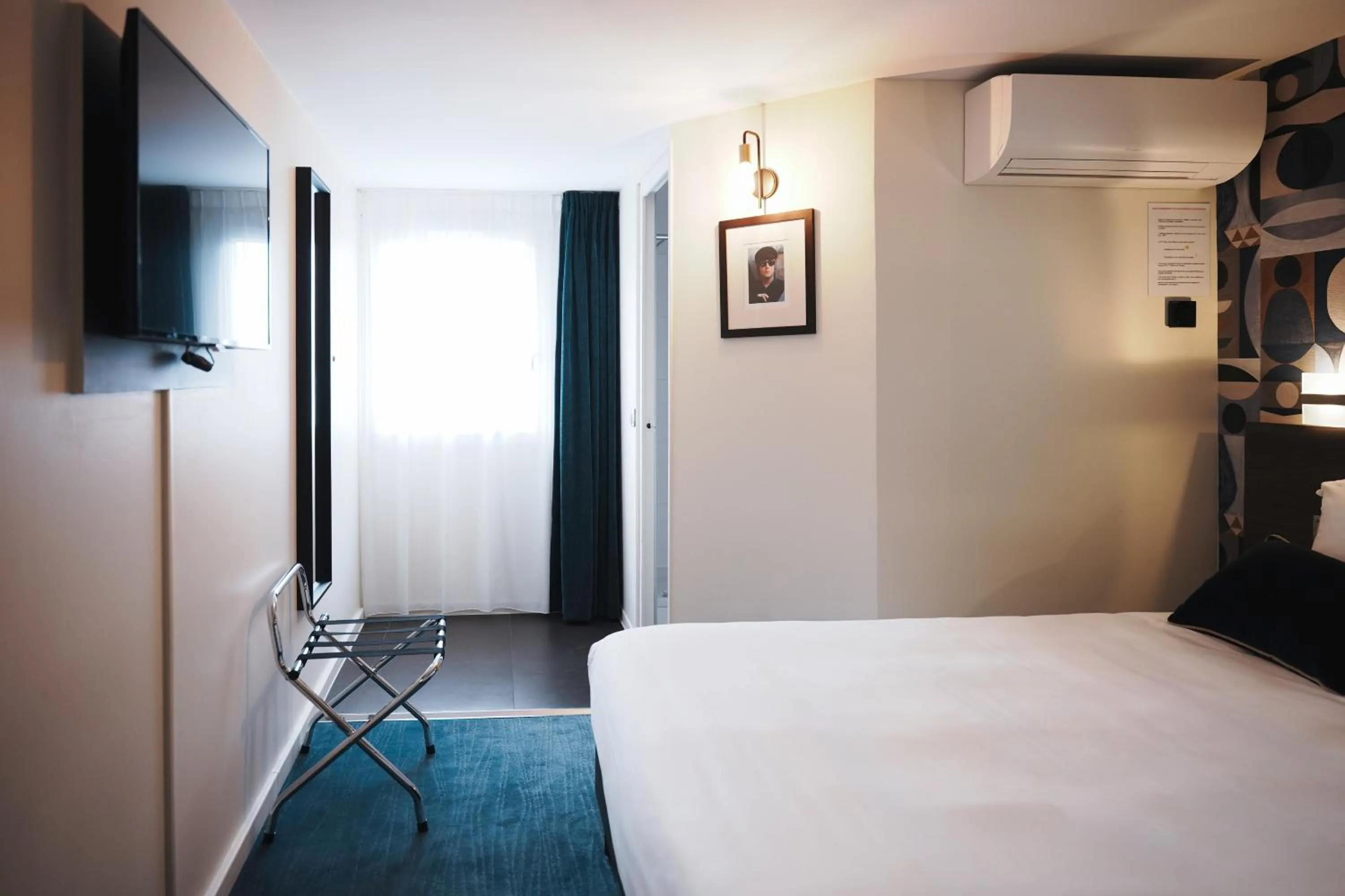 Photo of the whole room, Bed in Brit Hotel Confort Orly Morangis