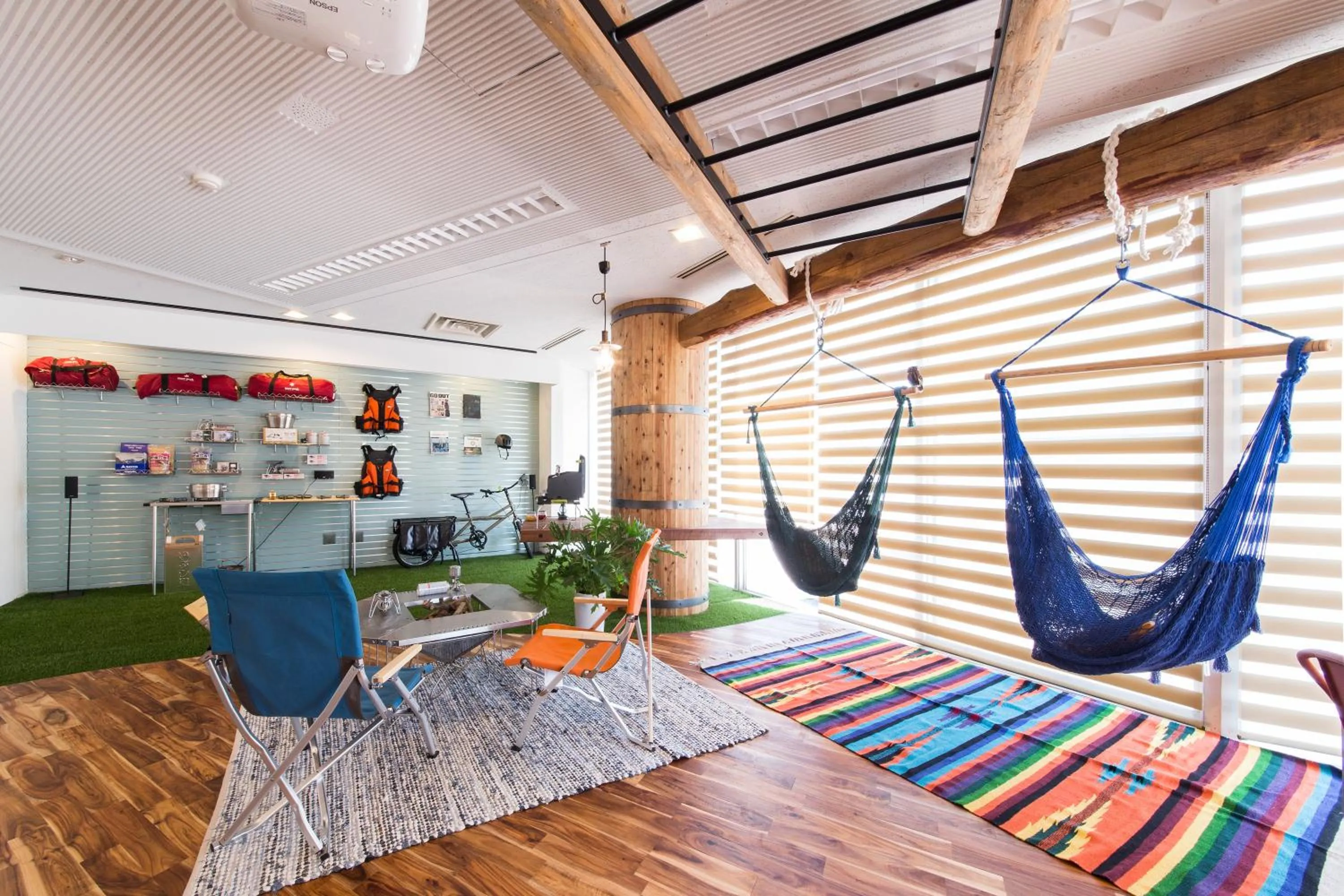 Communal lounge/ TV room in 365BASE outdoor hostel