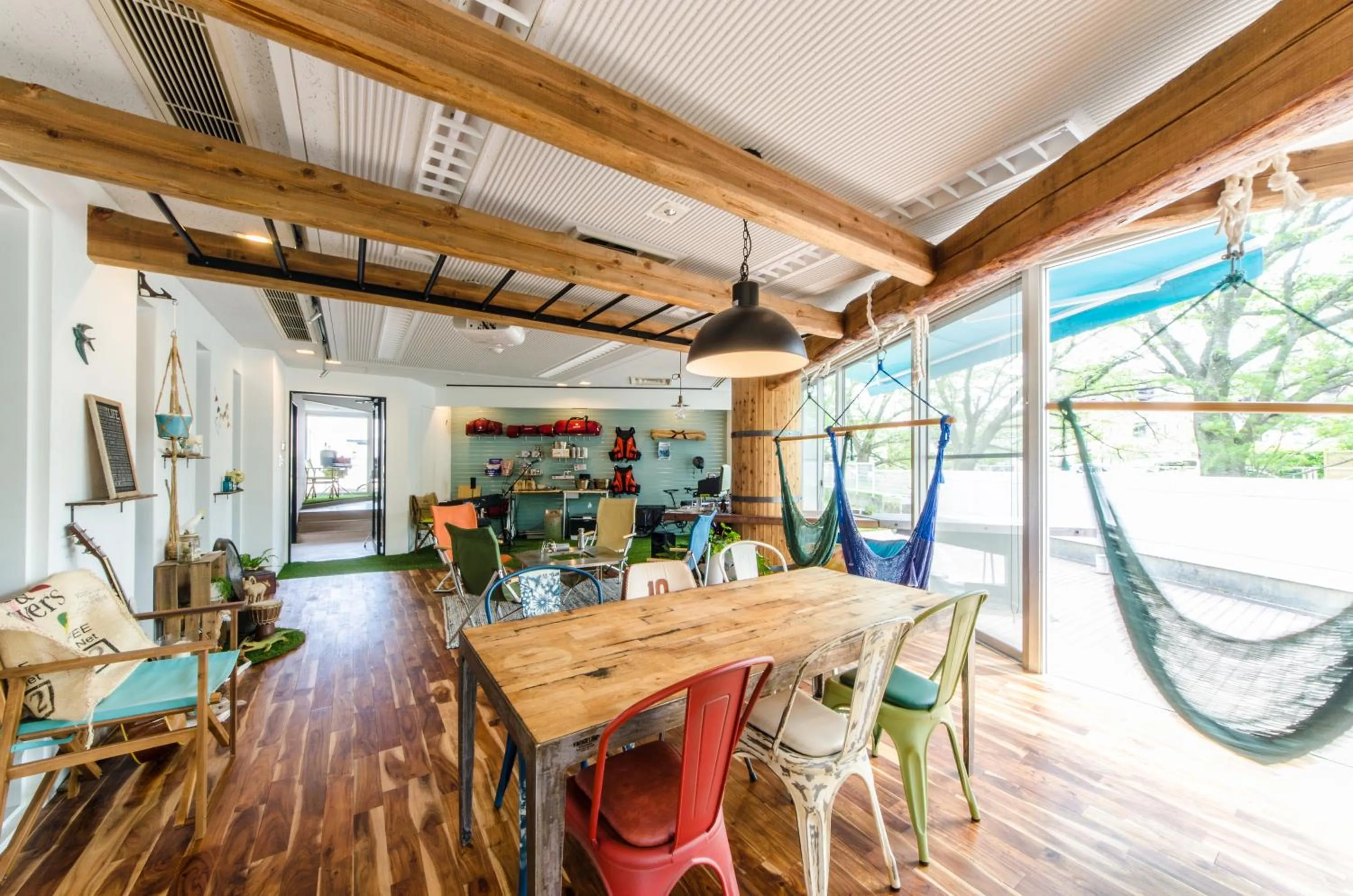 Communal lounge/ TV room in 365BASE outdoor hostel