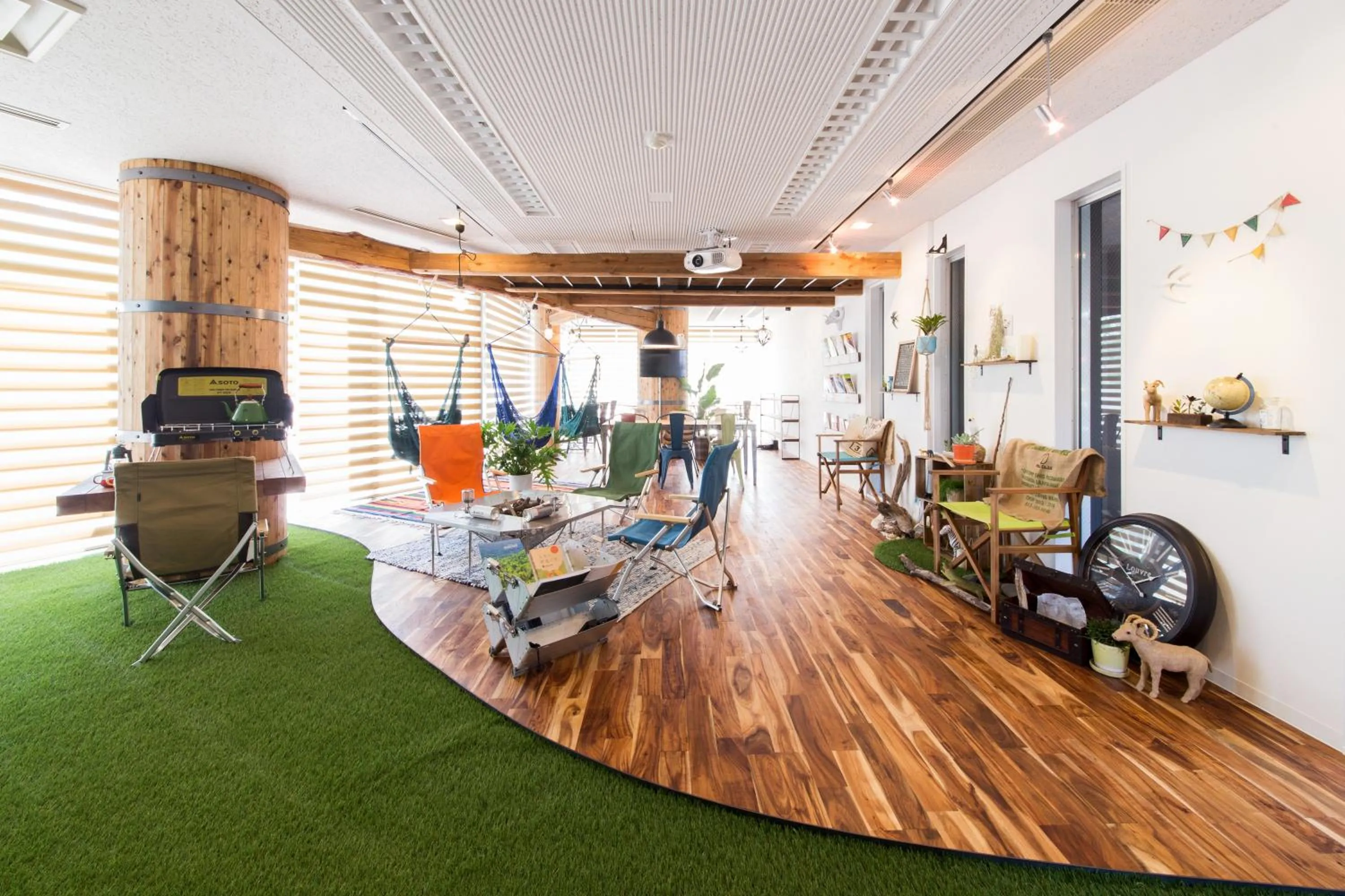 Communal lounge/ TV room in 365BASE outdoor hostel