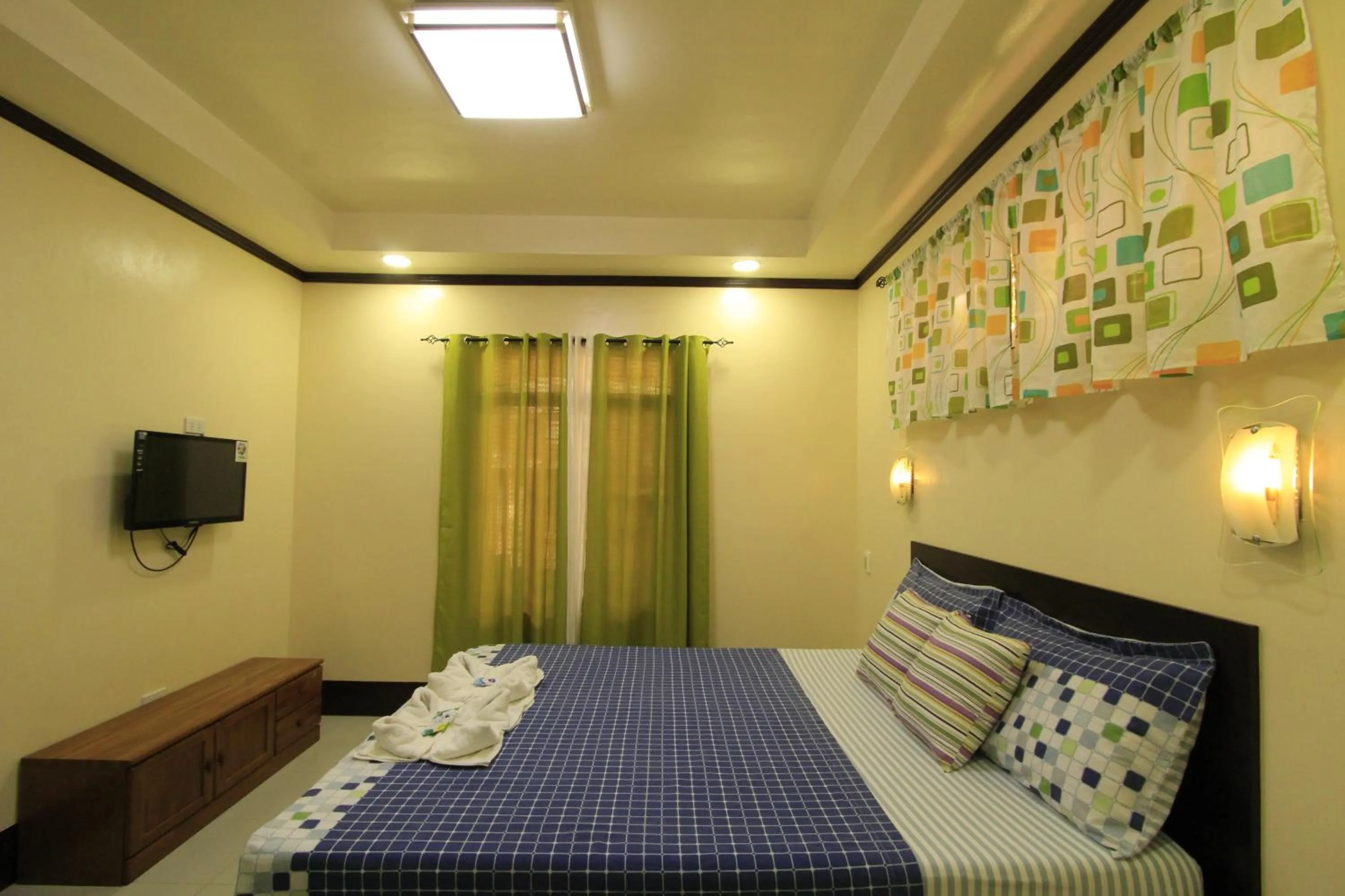 Bed in Aquilah Homestay Inn