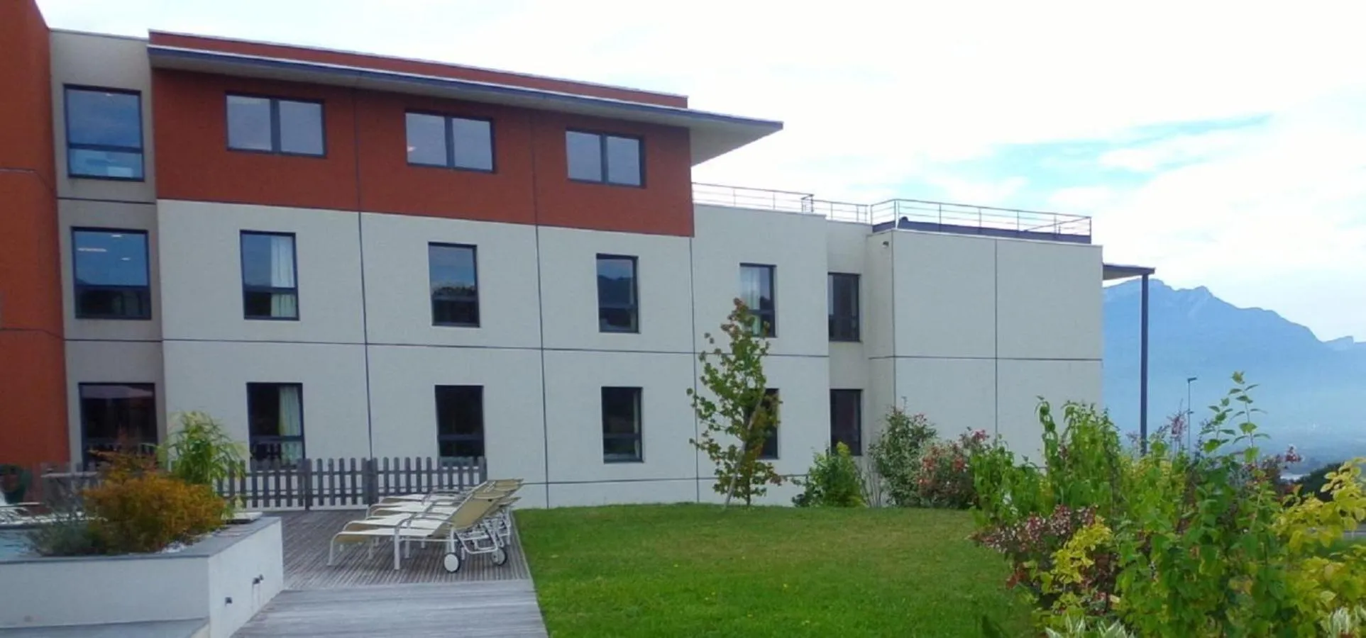 Garden view in Hôtel Le Palladior Voiron