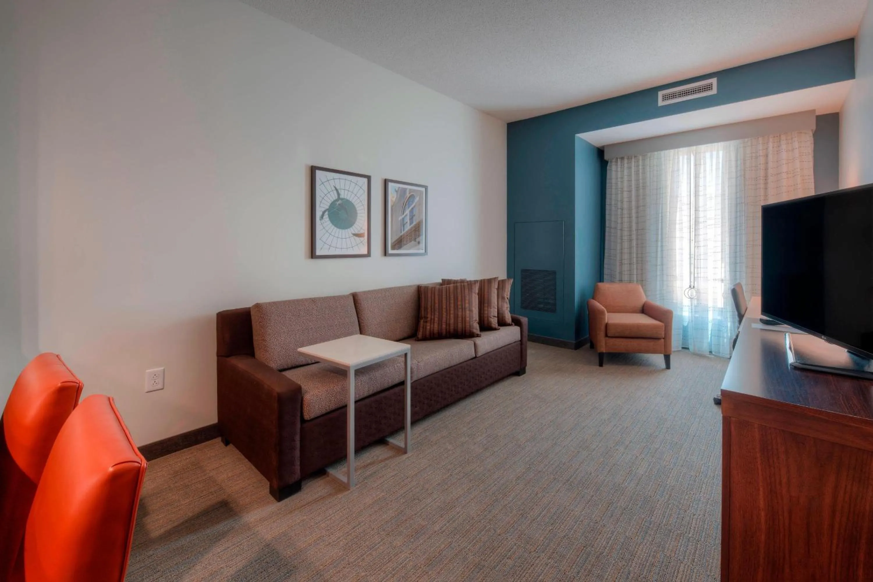 Living room in Residence Inn by Marriott Raleigh Downtown