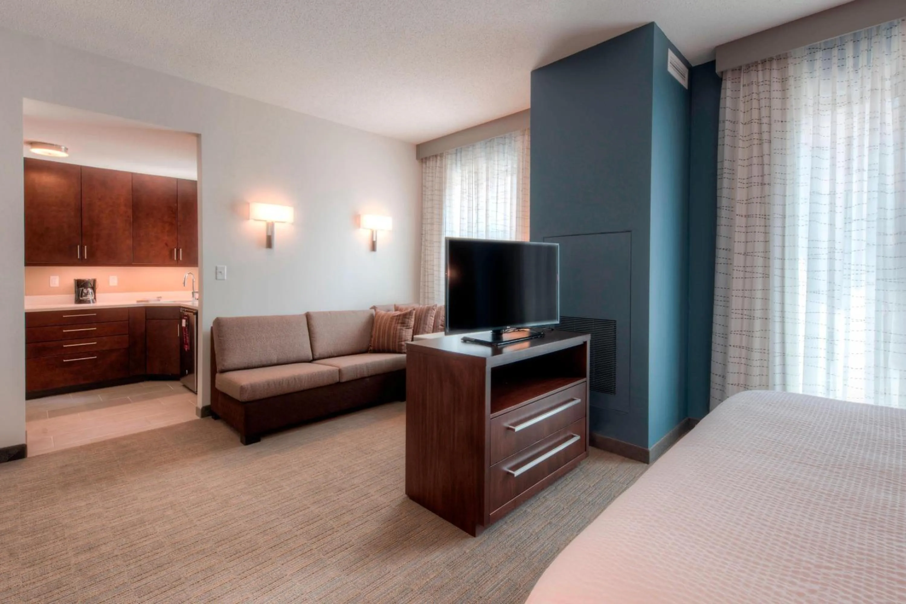 Living room, Bed in Residence Inn by Marriott Raleigh Downtown