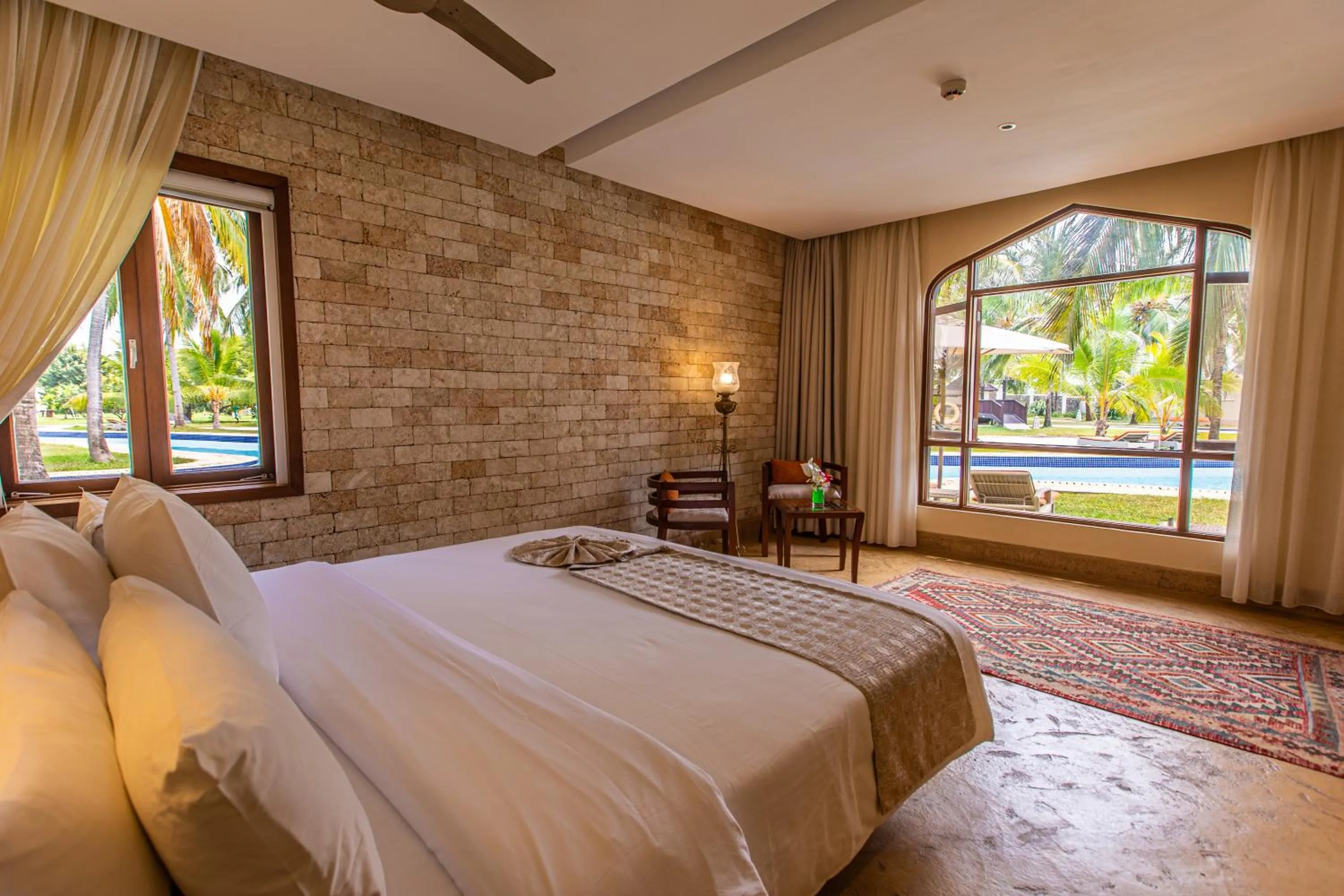 Bed in Silver Palm Spa & Resort