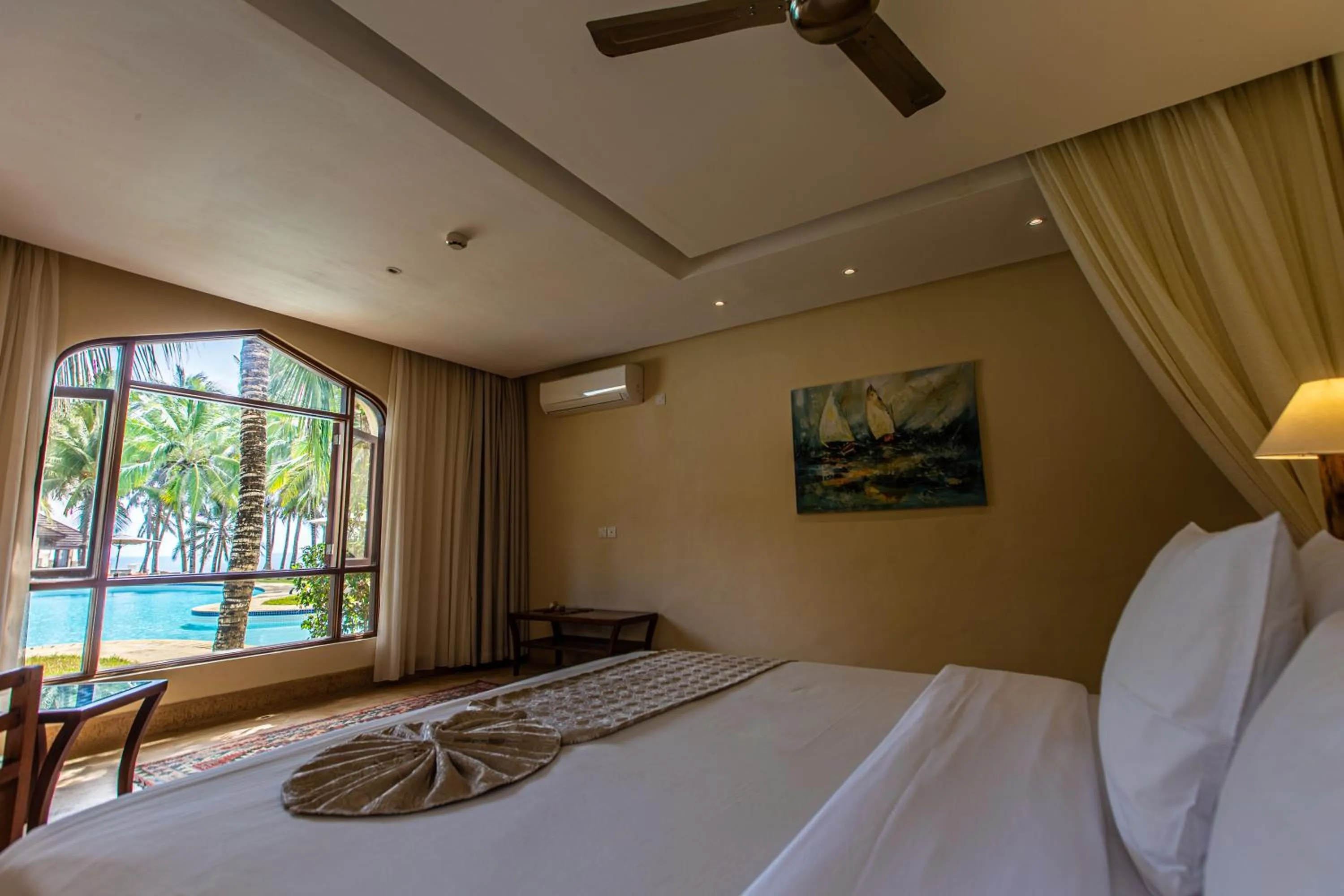 Bed in Silver Palm Spa & Resort