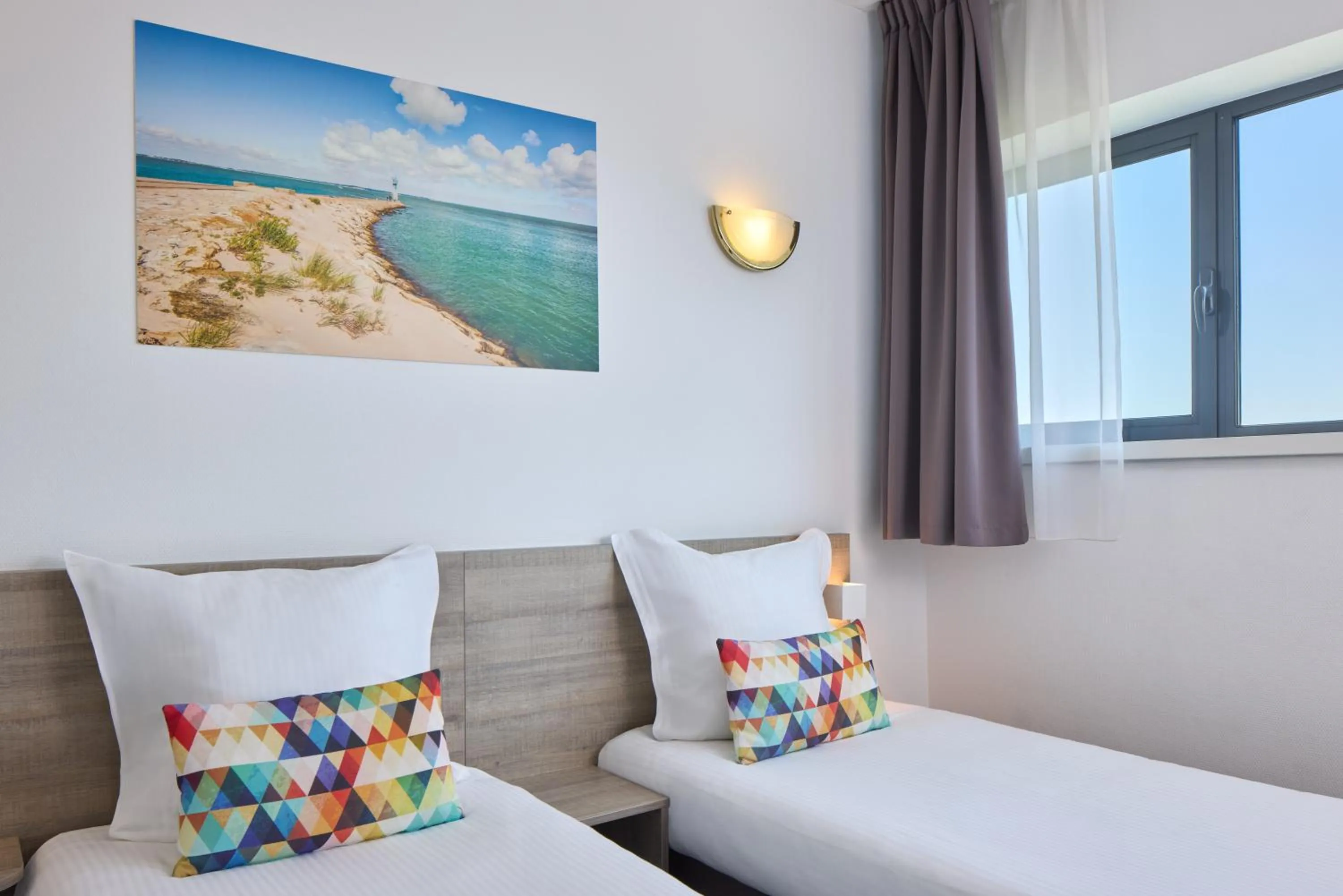 Bed in Zenitude Hôtel-Résidences Bordeaux Aéroport Mérignac