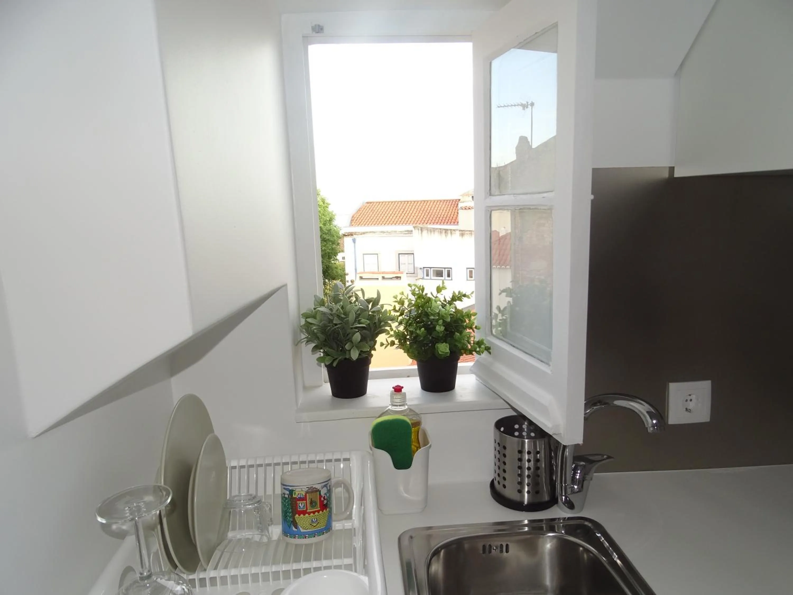 Kitchen or kitchenette in Apartments Center Castelo de São Jorge