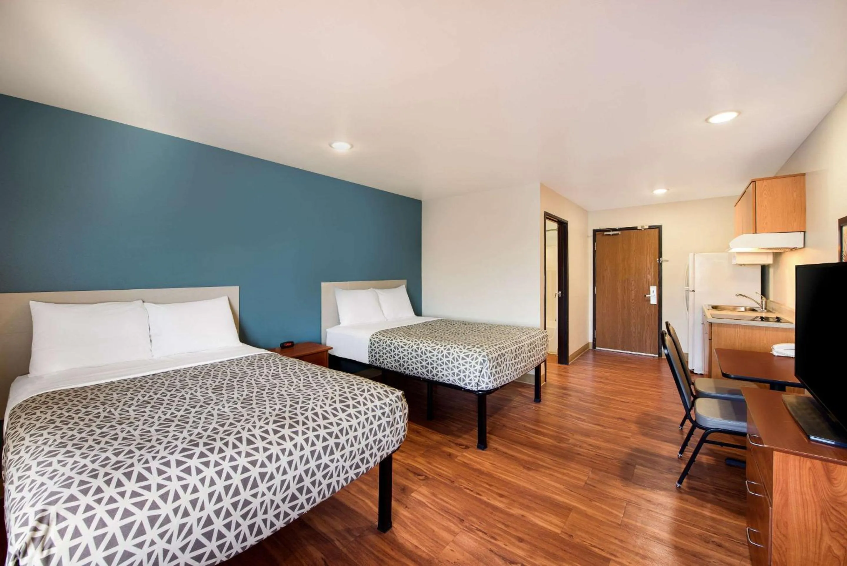 Bedroom, Bed in WoodSpring Suites Columbus Southeast