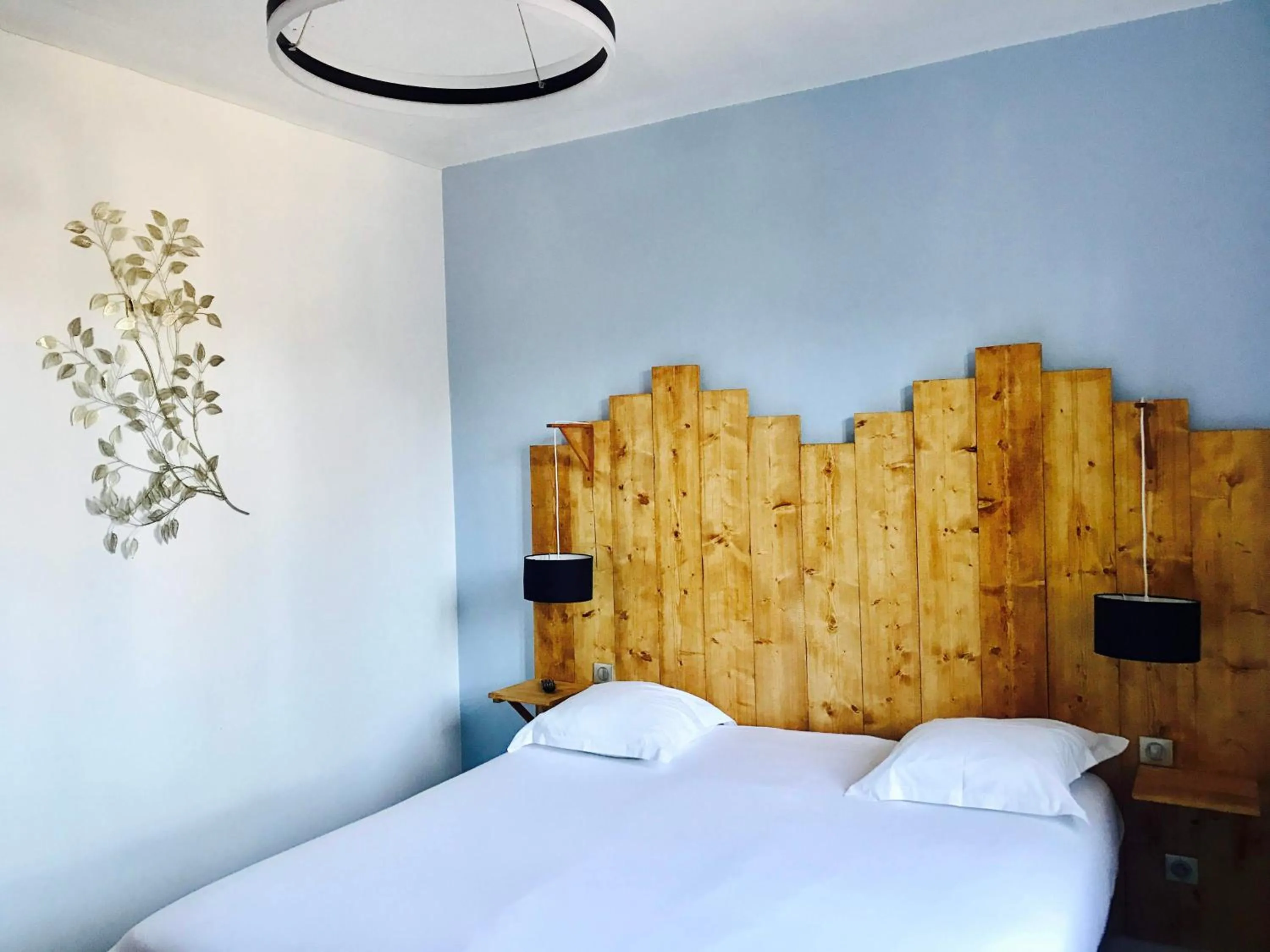 Bed in Le Relais Du Lac