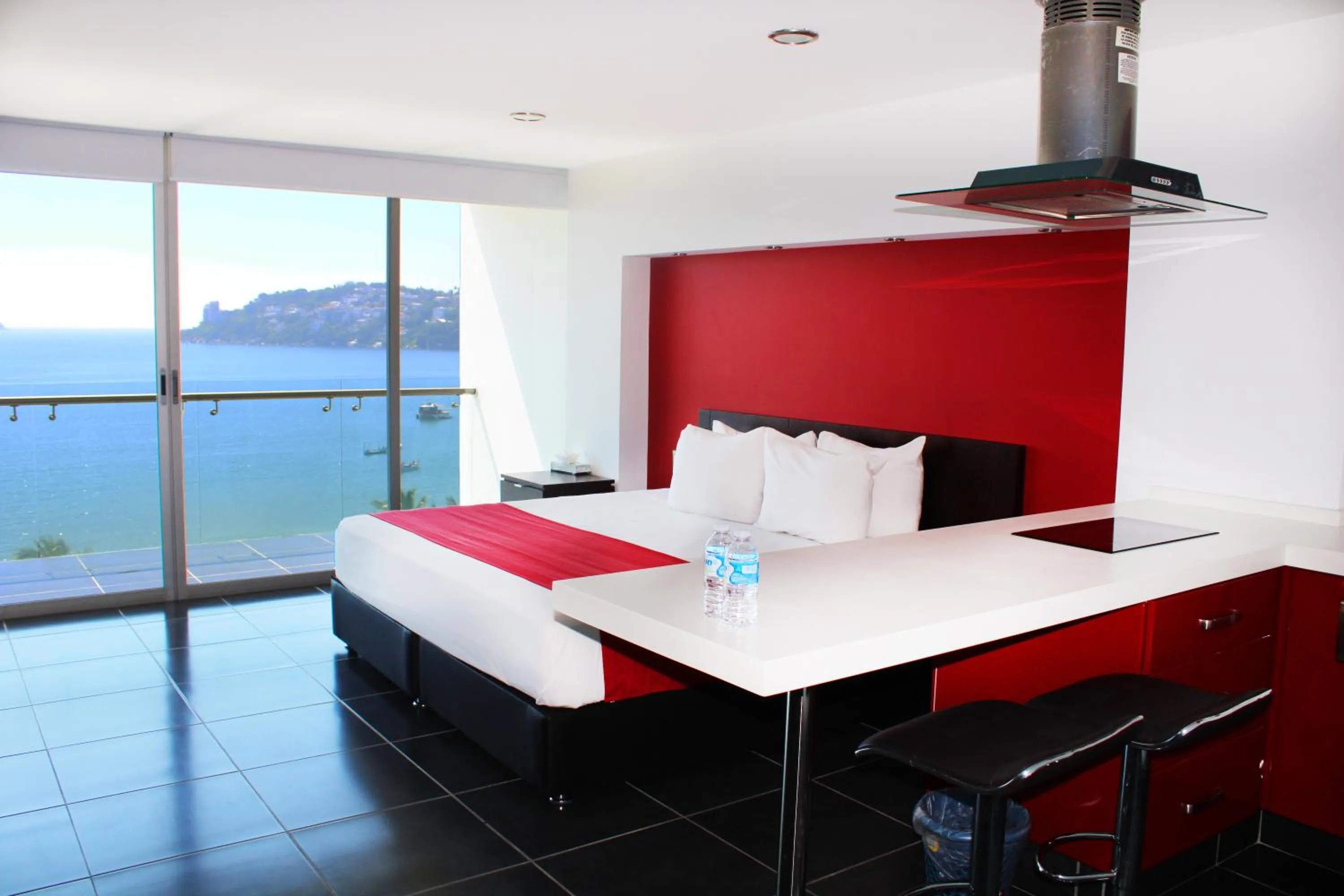Landmark view, Bed in Ramada by Wyndham Acapulco Hotel & Suites