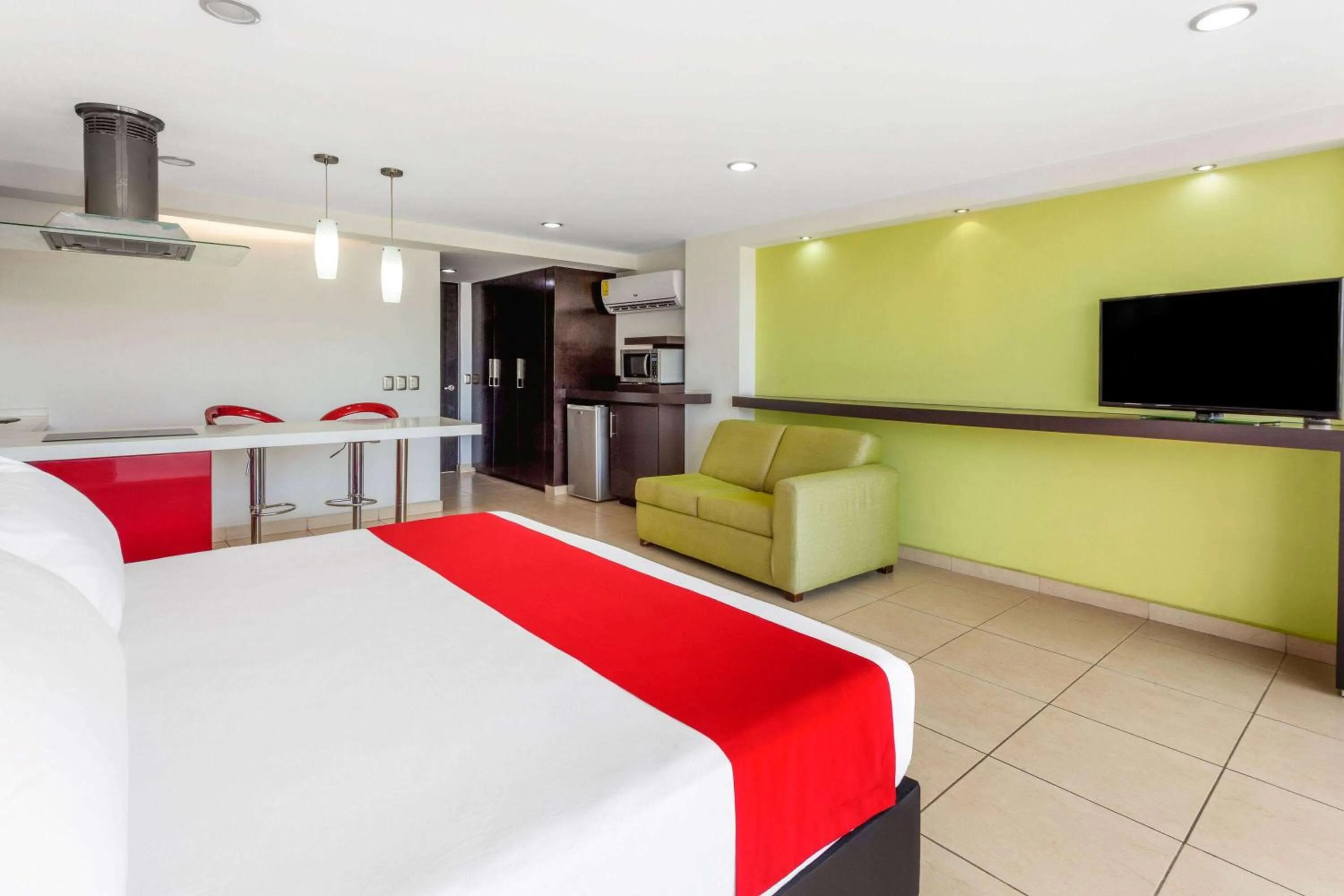 Photo of the whole room, Bed in Ramada by Wyndham Acapulco Hotel & Suites