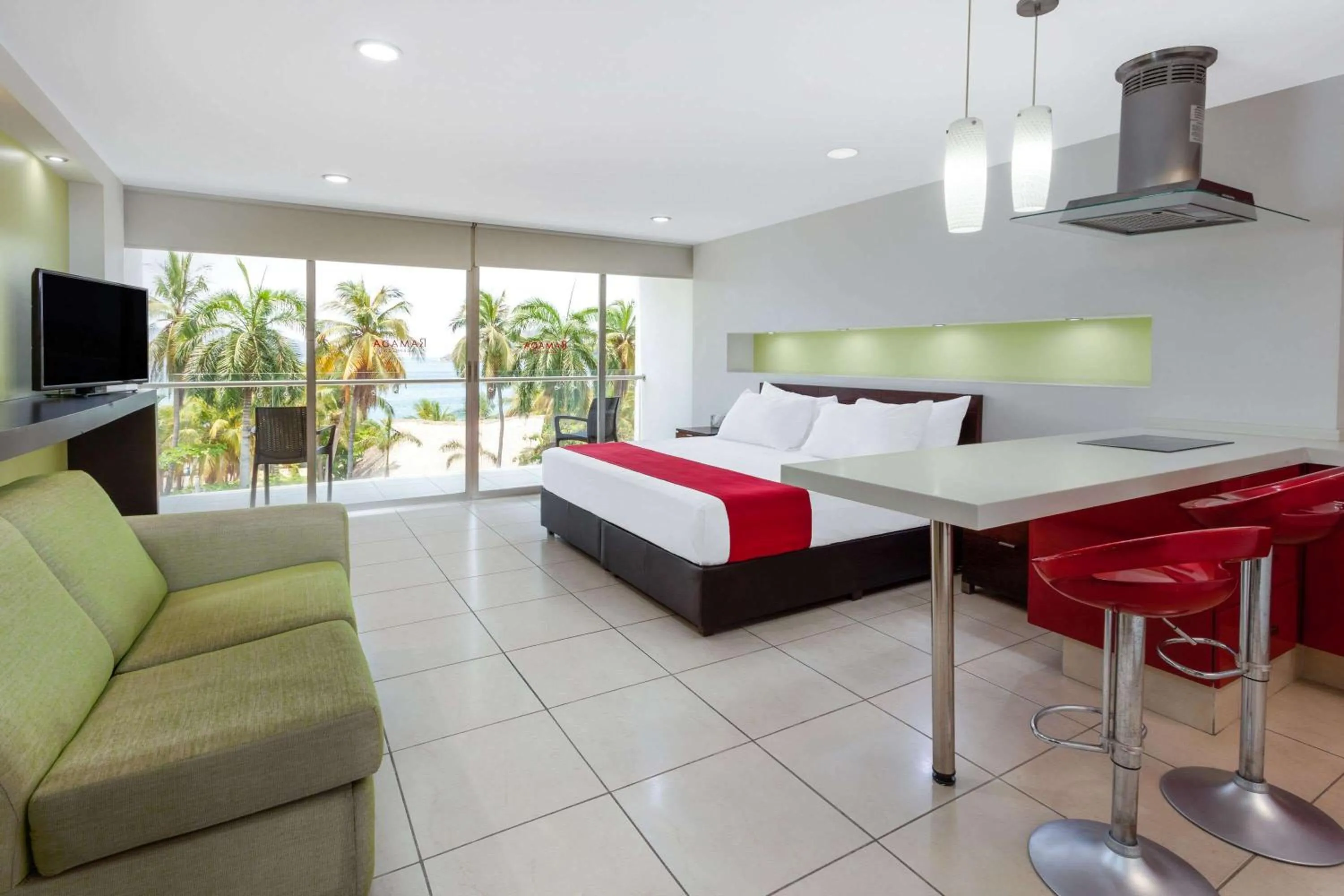 Photo of the whole room, Bed in Ramada by Wyndham Acapulco Hotel & Suites