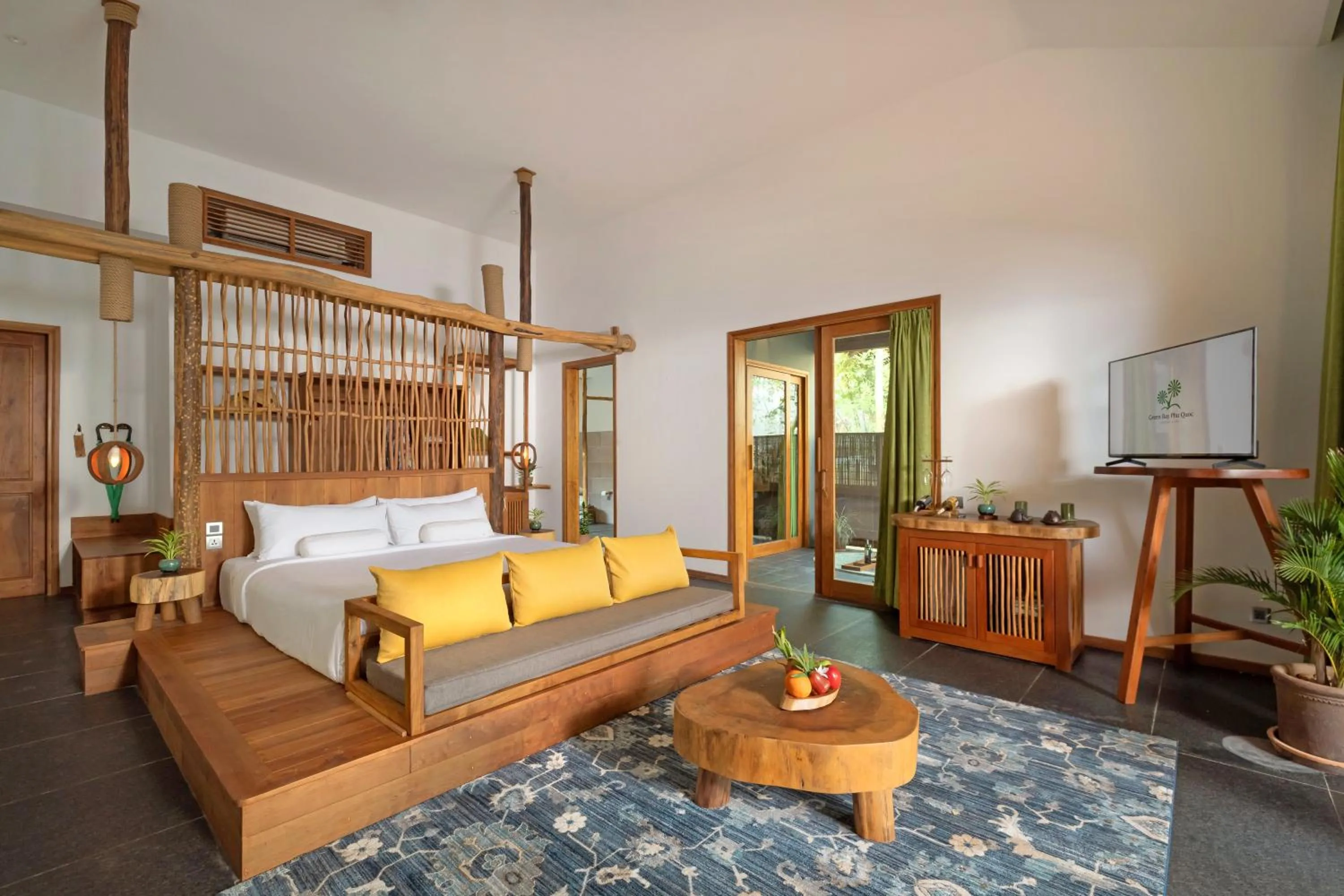 Communal lounge/ TV room, Bed in Green Bay Phu Quoc Resort & Spa