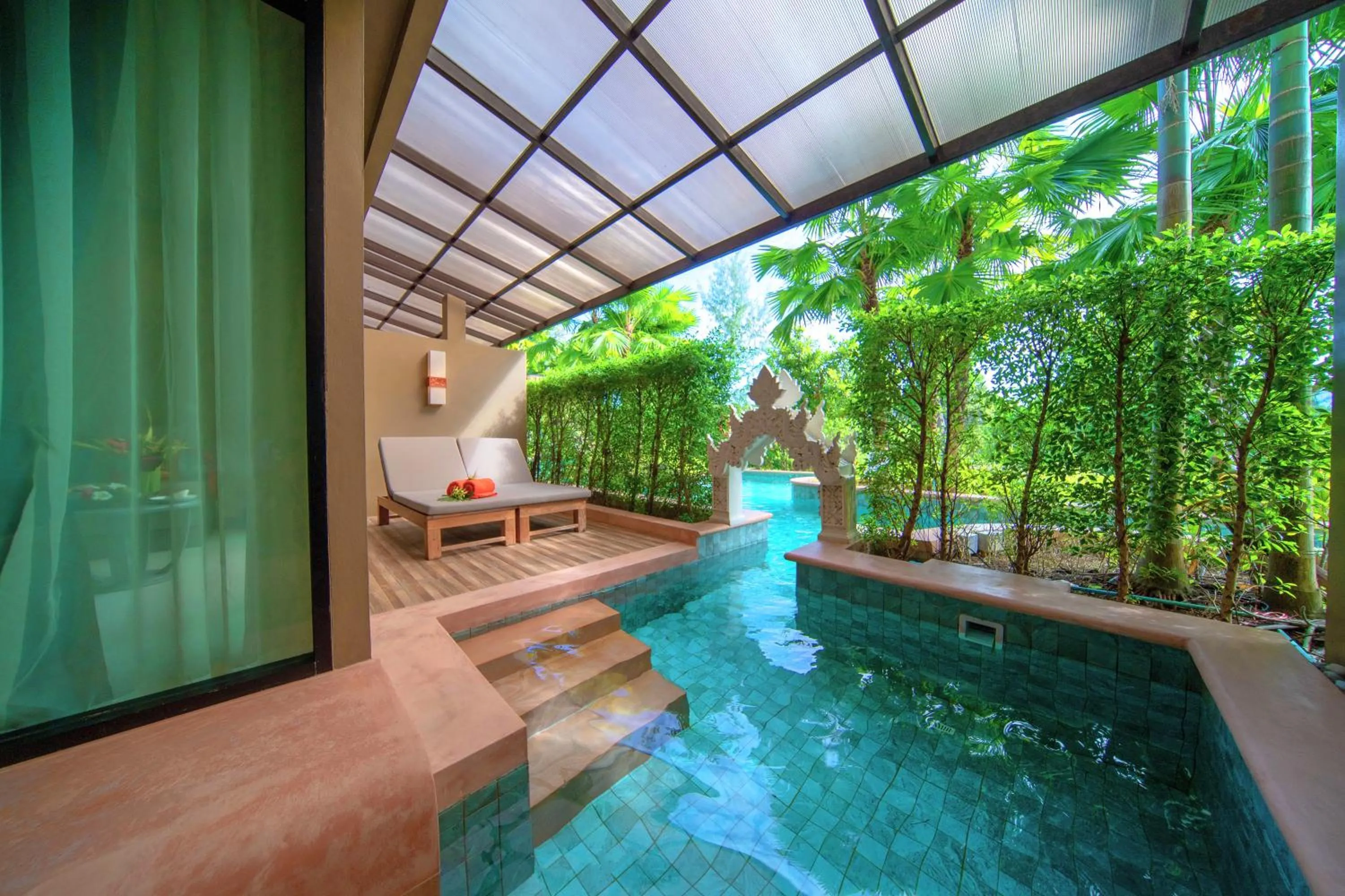 Pool view in Maikhao Palm Beach Resort - SHA Plus