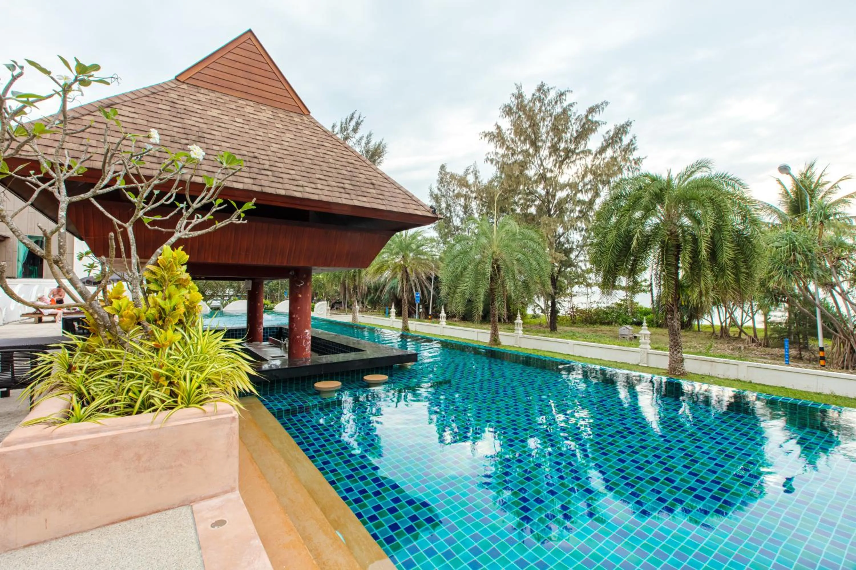 Swimming pool in Maikhao Palm Beach Resort - SHA Plus