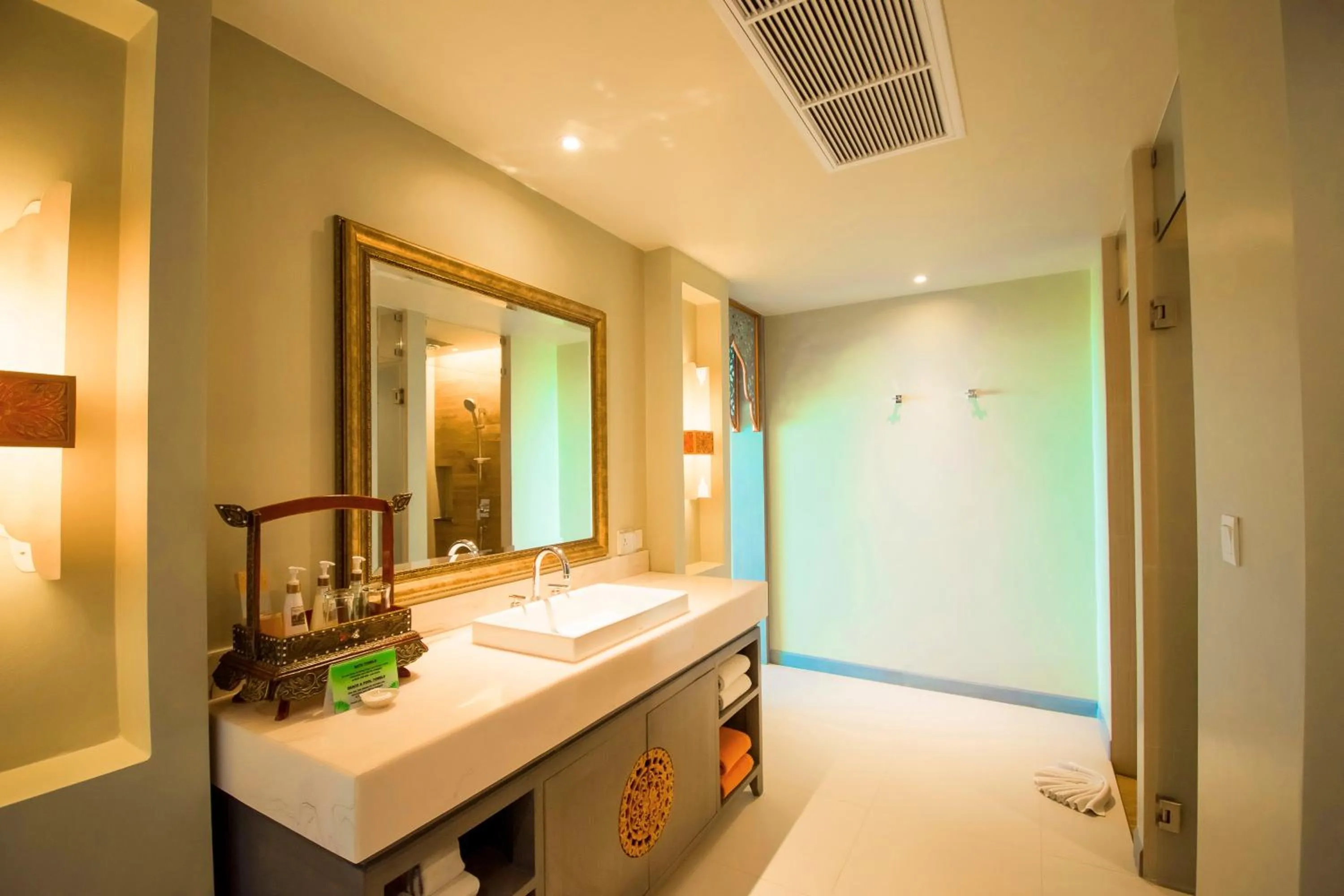 Bathroom in Maikhao Palm Beach Resort - SHA Plus