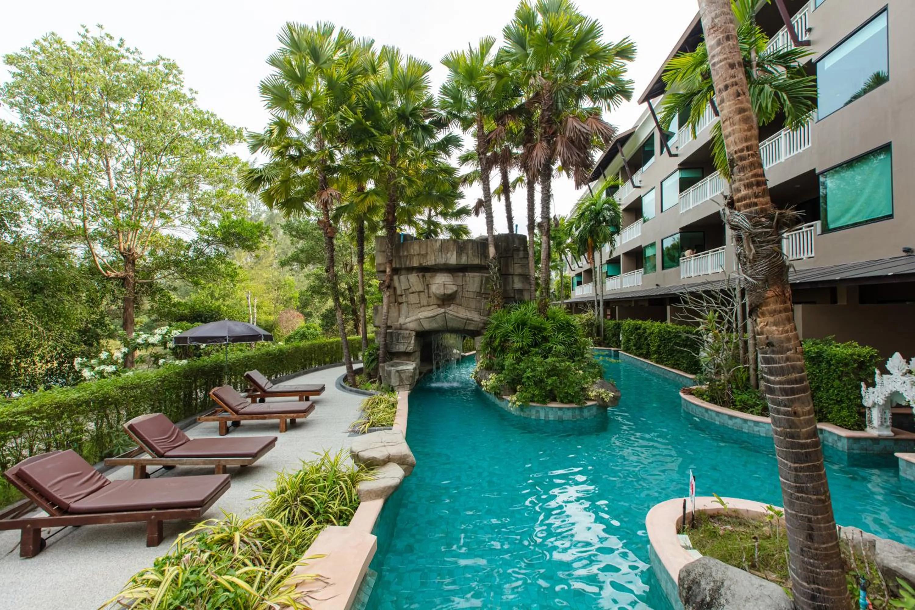 Swimming pool in Maikhao Palm Beach Resort - SHA Plus