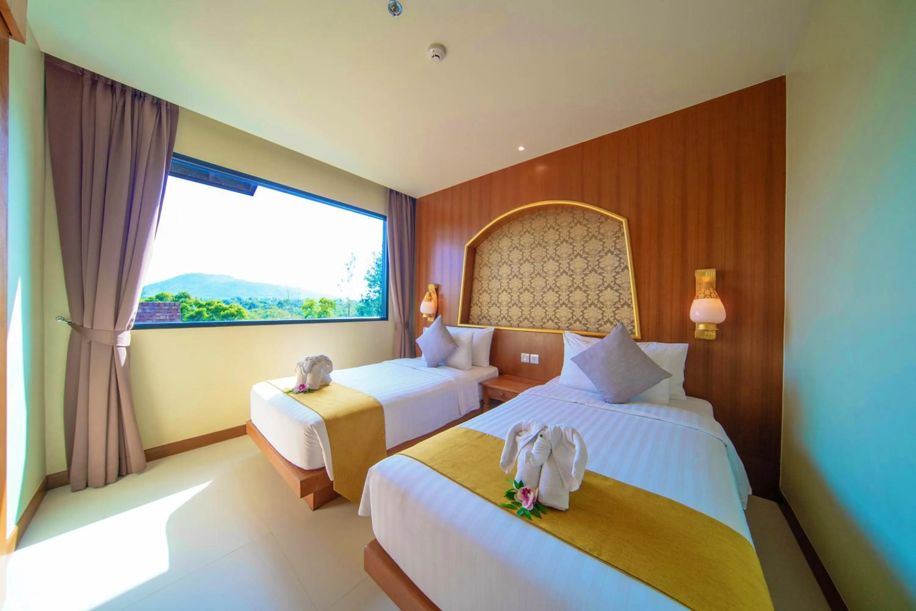 Bed in Maikhao Palm Beach Resort - SHA Plus