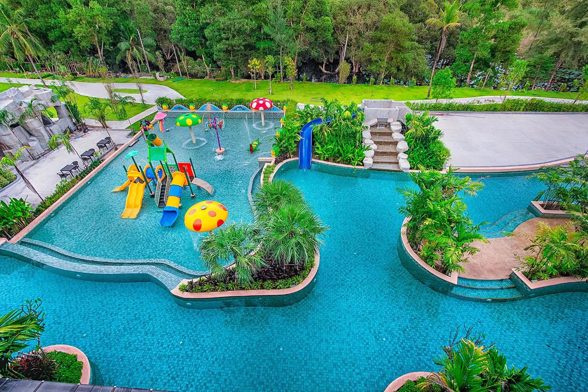 Swimming pool in Maikhao Palm Beach Resort - SHA Plus
