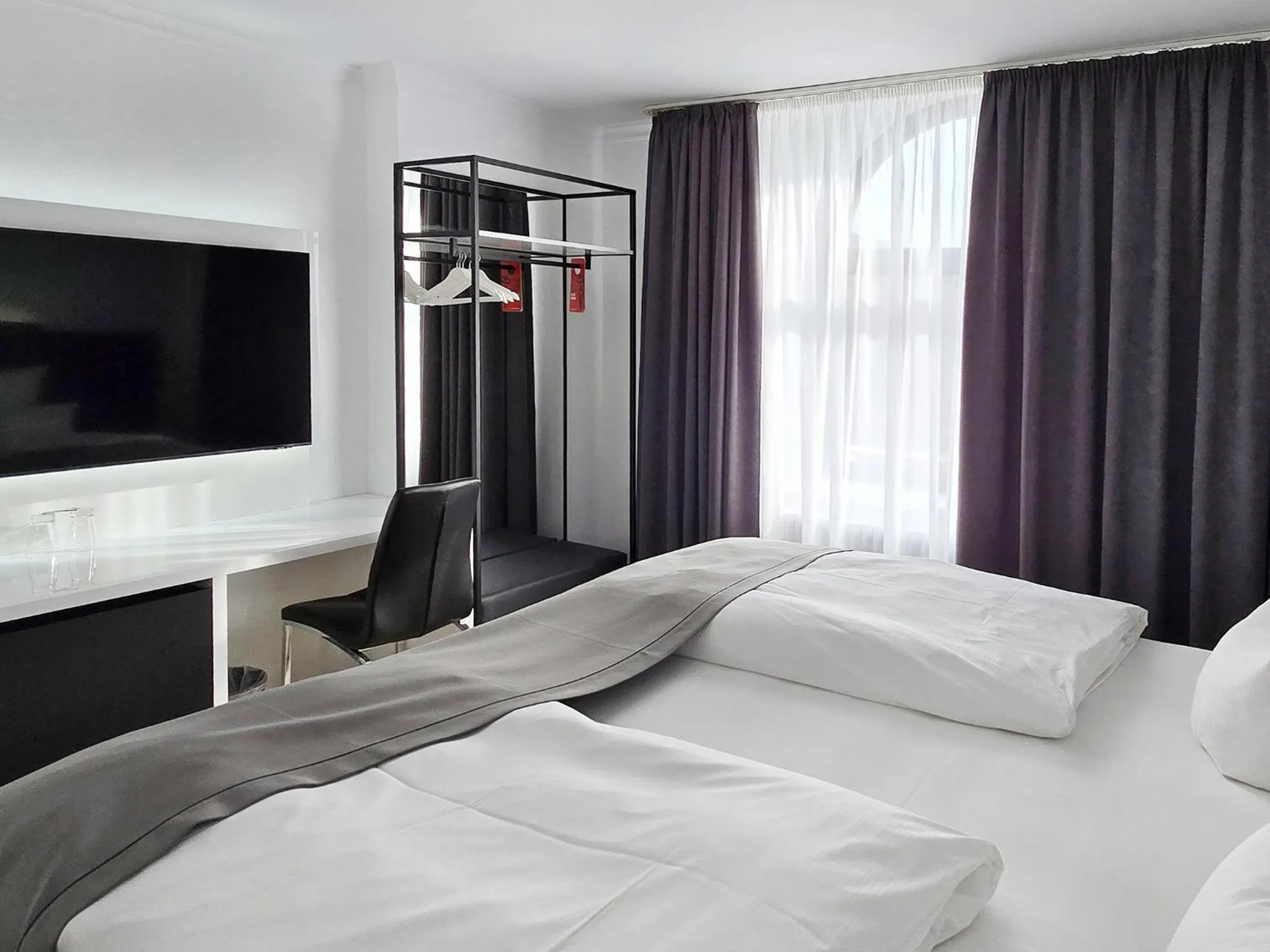 Photo of the whole room, Bed in DORMERO Hotel Coburg