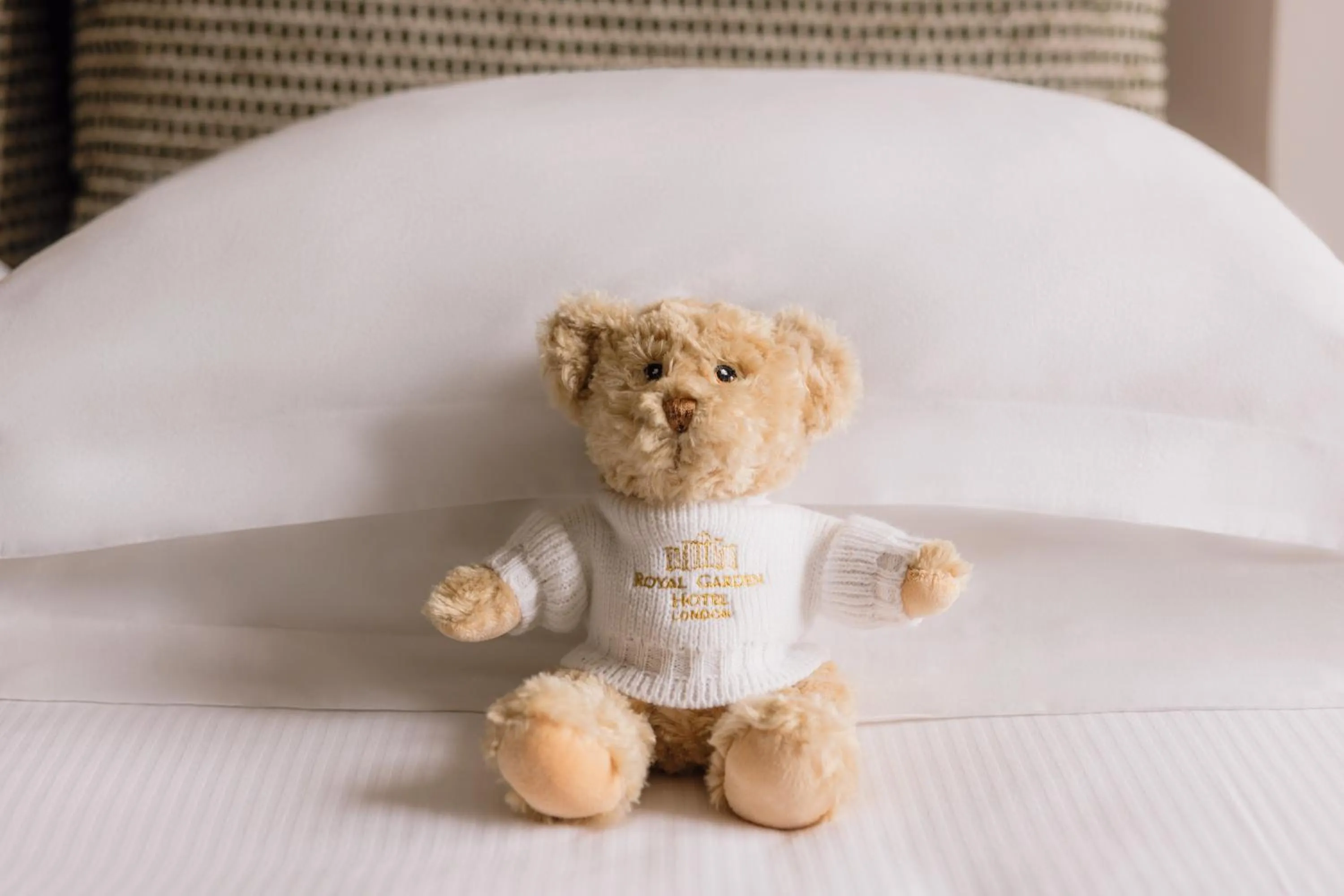 Bed in Royal Garden Hotel