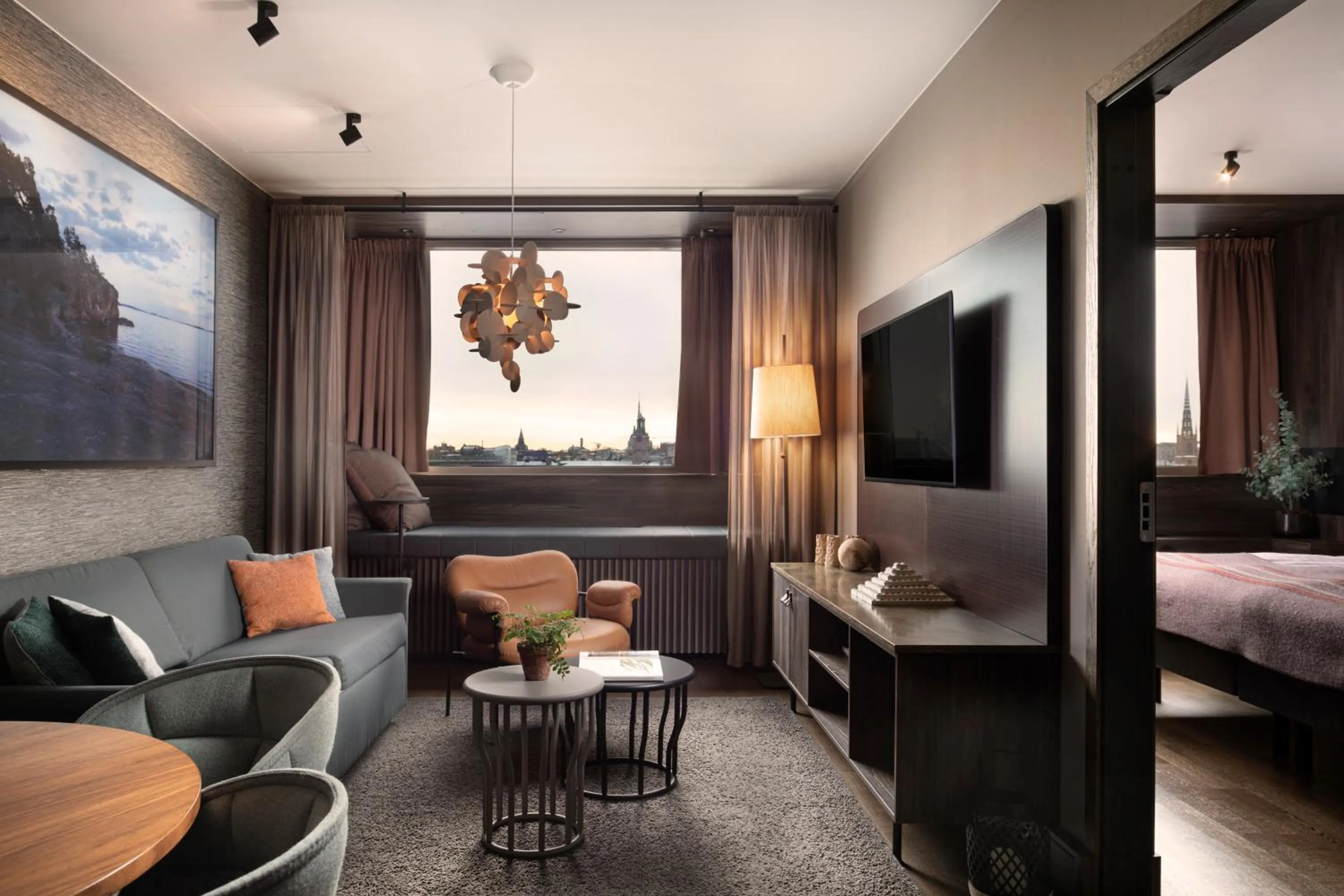 Living room, Bed in Downtown Camper by Scandic